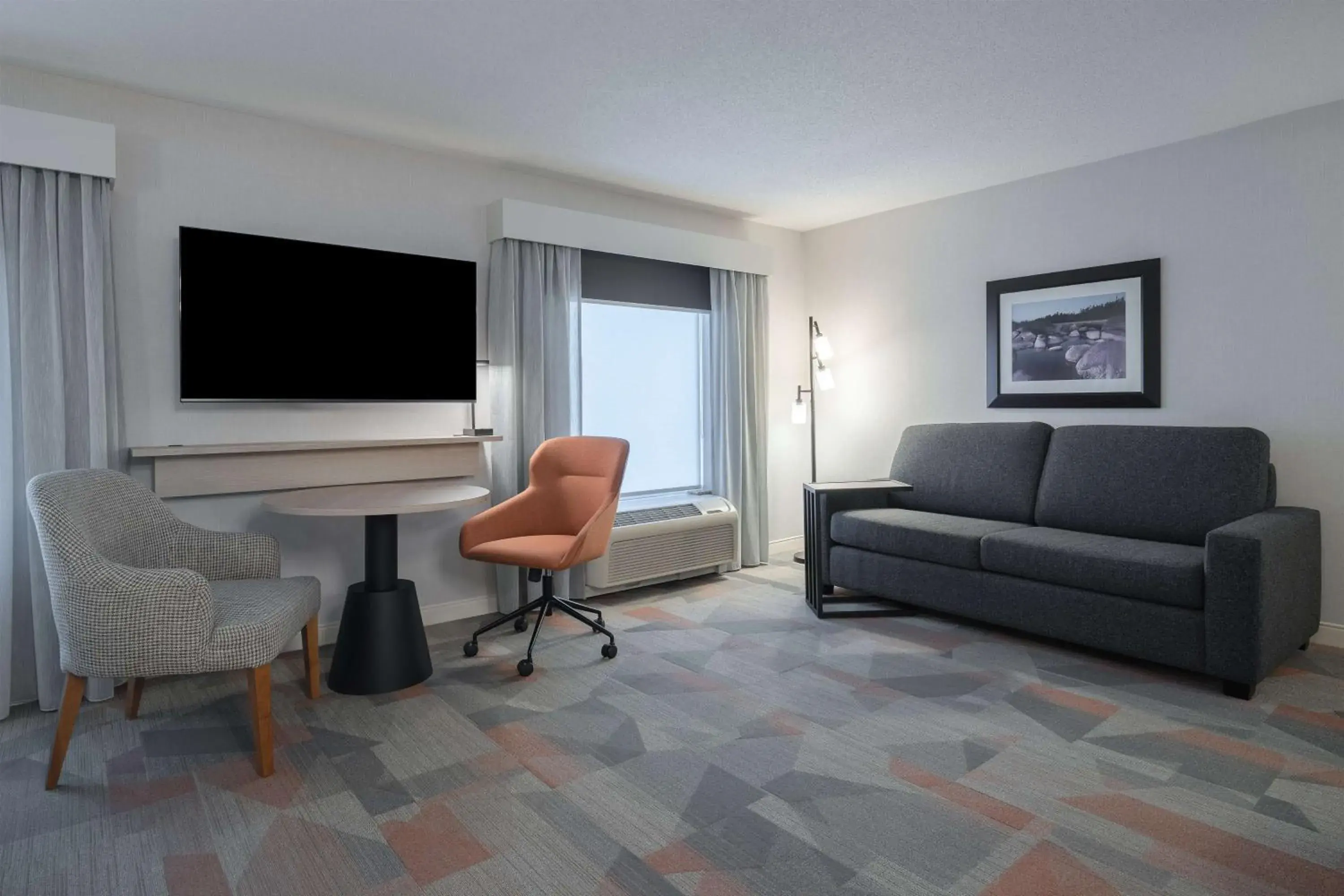 Living room in Hampton Inn & Suites by Hilton Moncton Living room in Hampton Inn & Suites by Hilton Moncton
