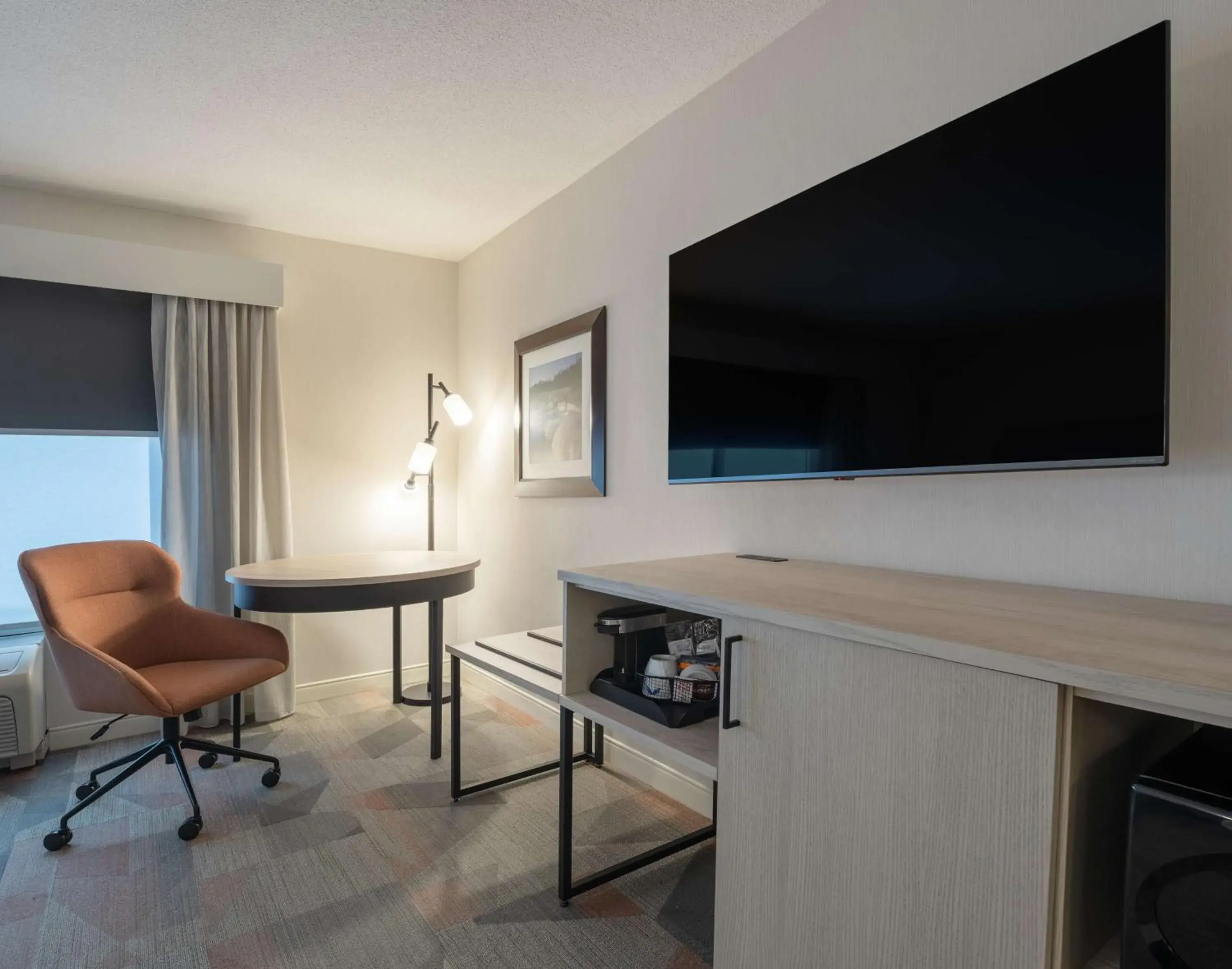 Living room in Hampton Inn & Suites by Hilton Moncton Living room in Hampton Inn & Suites by Hilton Moncton
