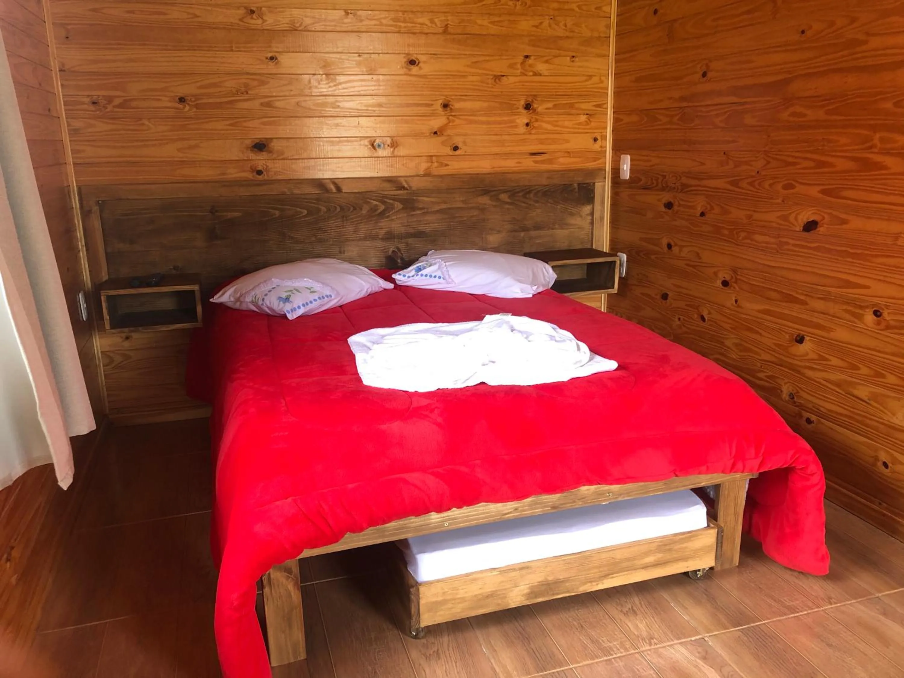 Bed in Pousada Santa Terezinha