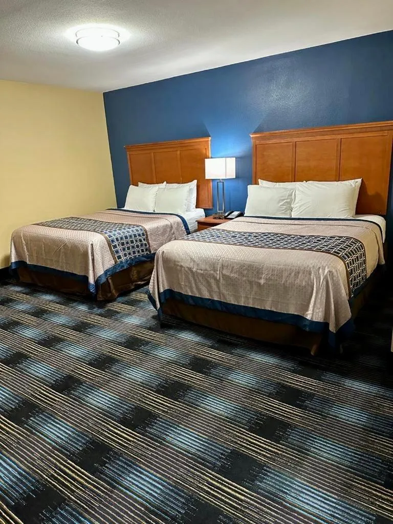 Bed in Swiss Chalets Village Inn