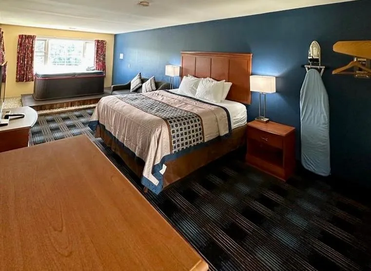 Bed in Swiss Chalets Village Inn