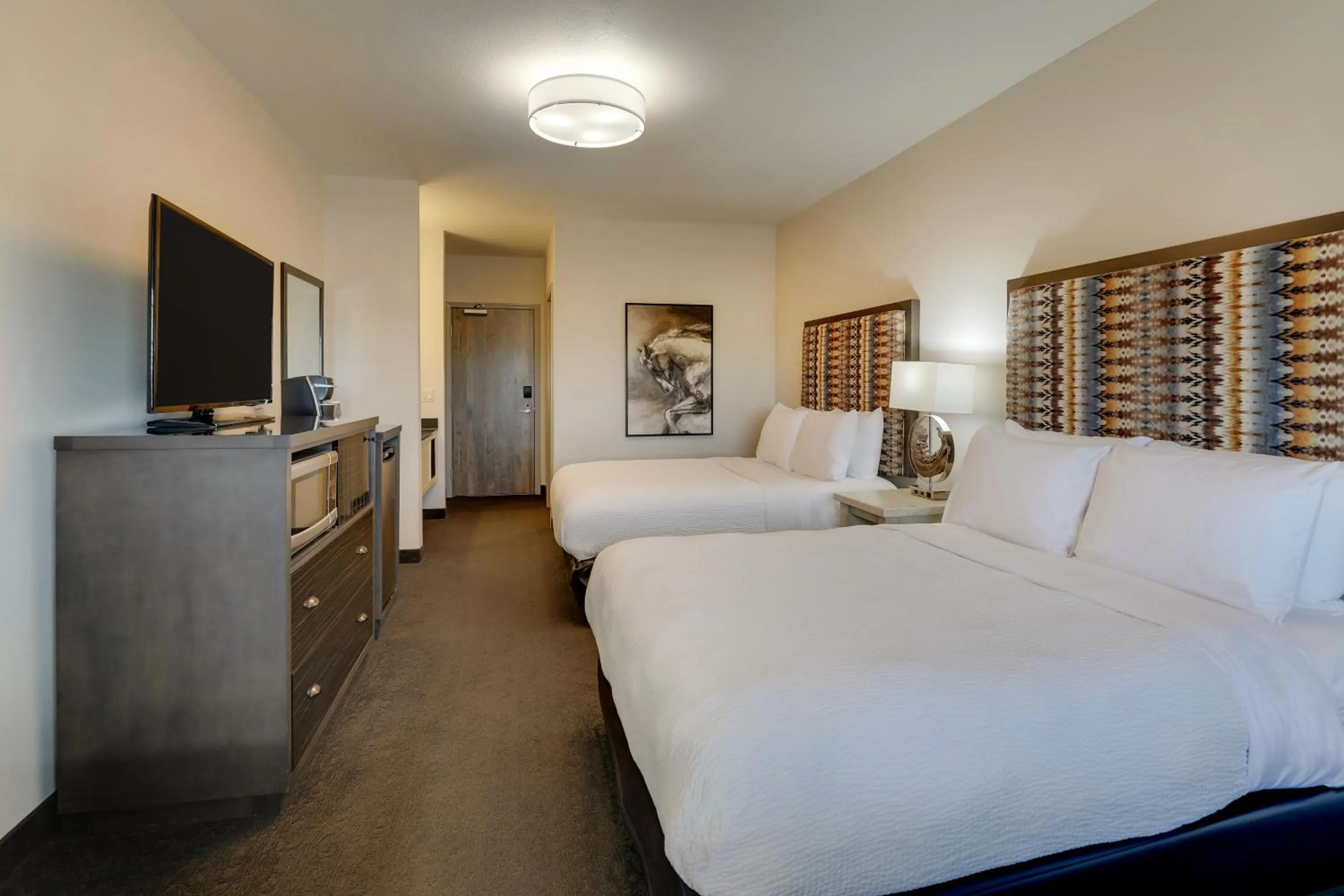 Bed in Stoney Creek Hotel Tulsa - Broken Arrow