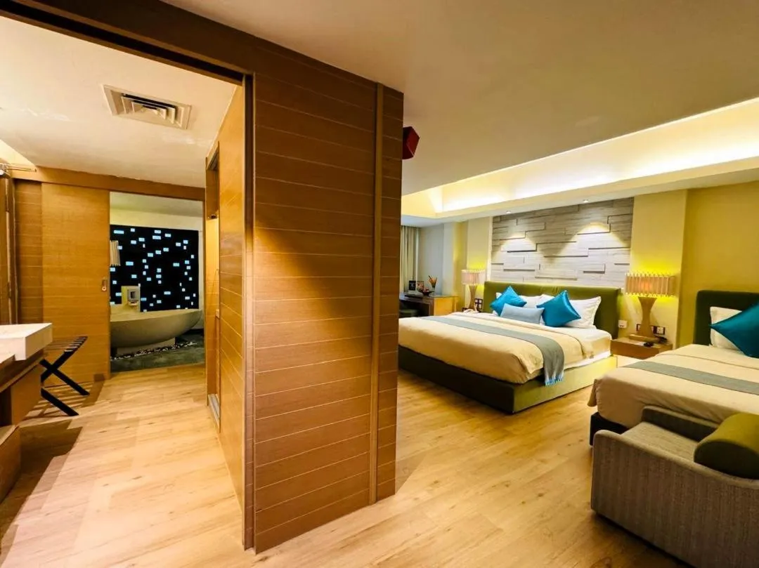 Bed in Cyberview Resort & Spa