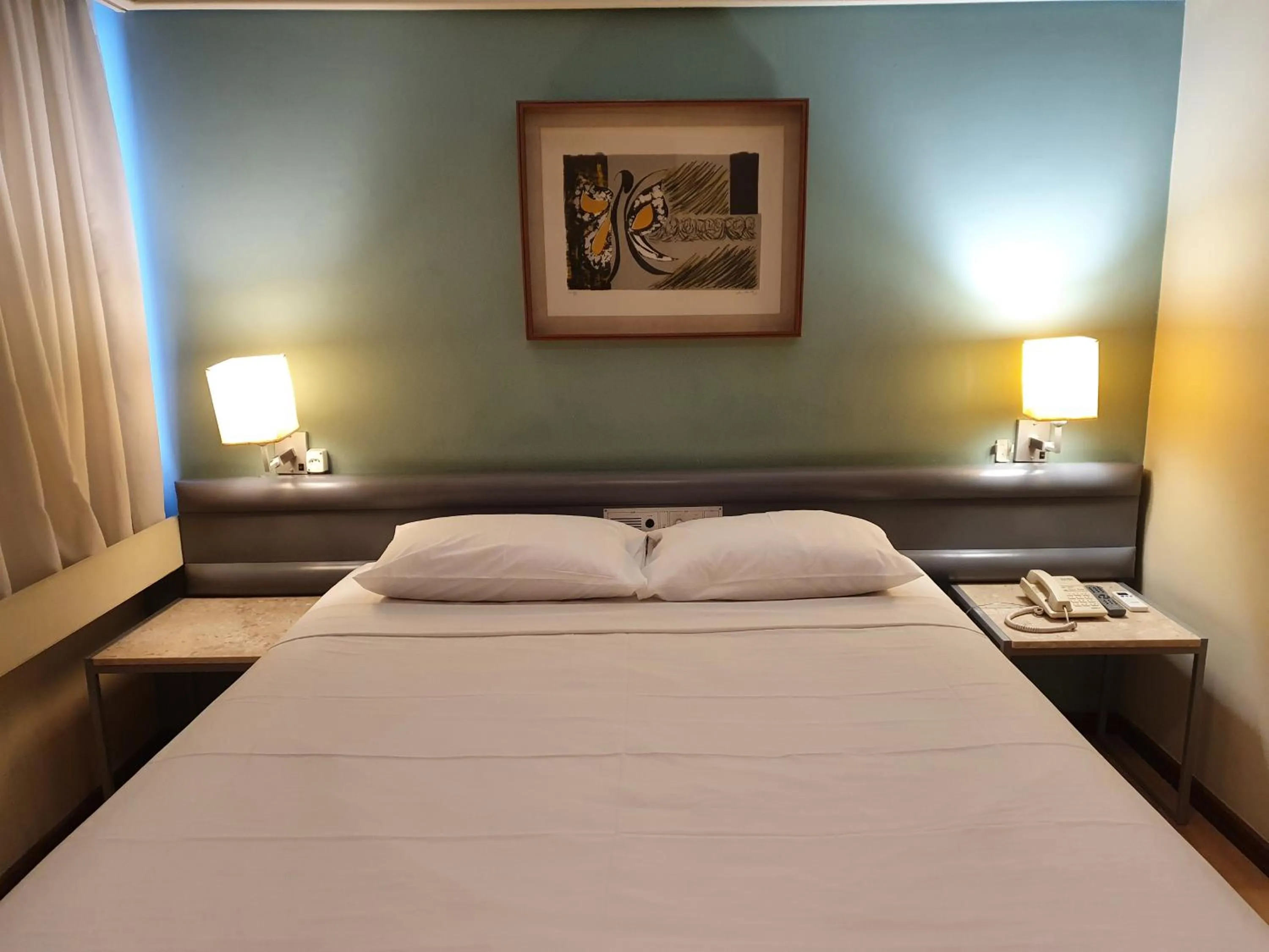Bed in Alta Reggia Plaza Hotel