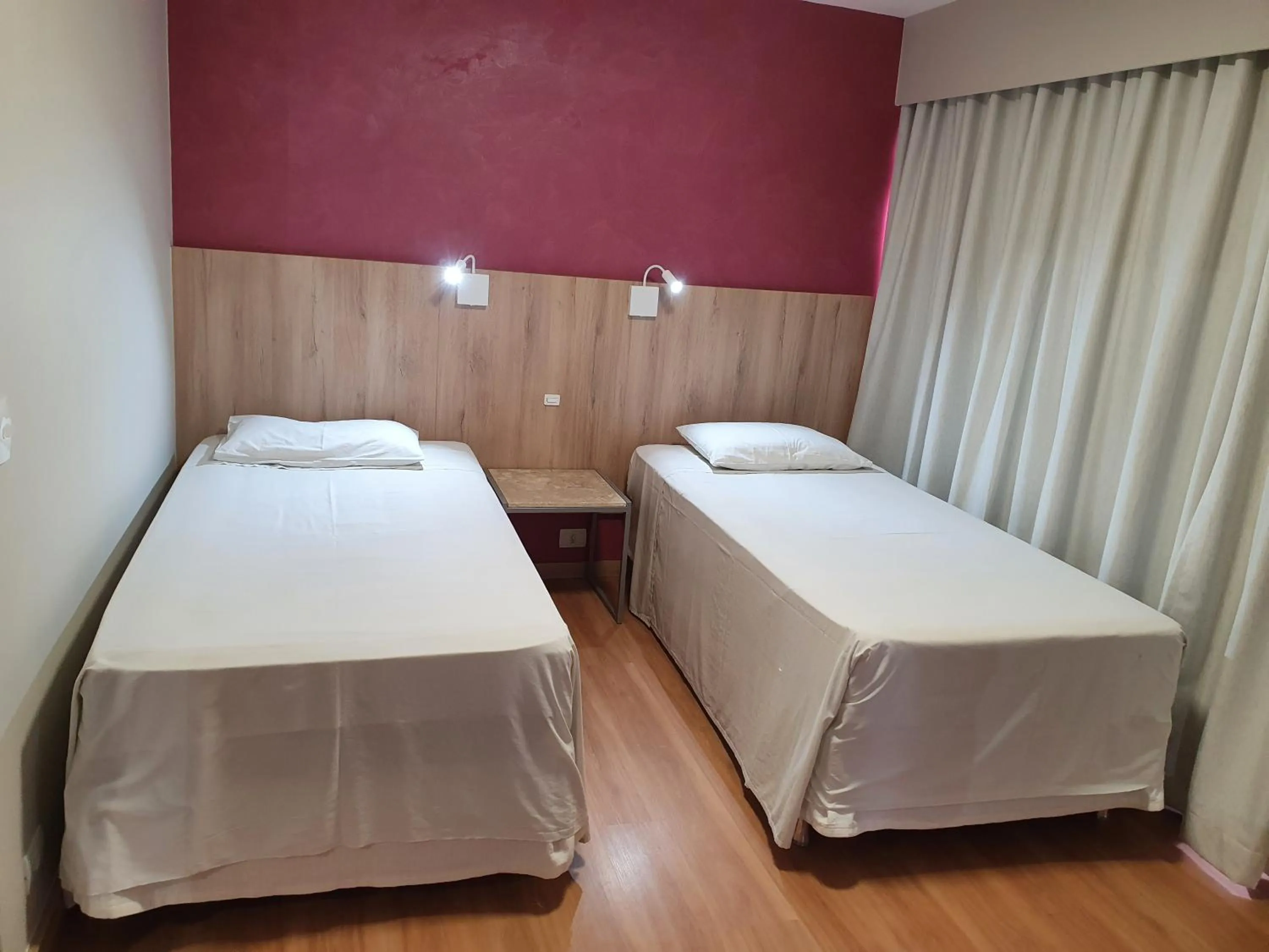 Bed in Alta Reggia Plaza Hotel