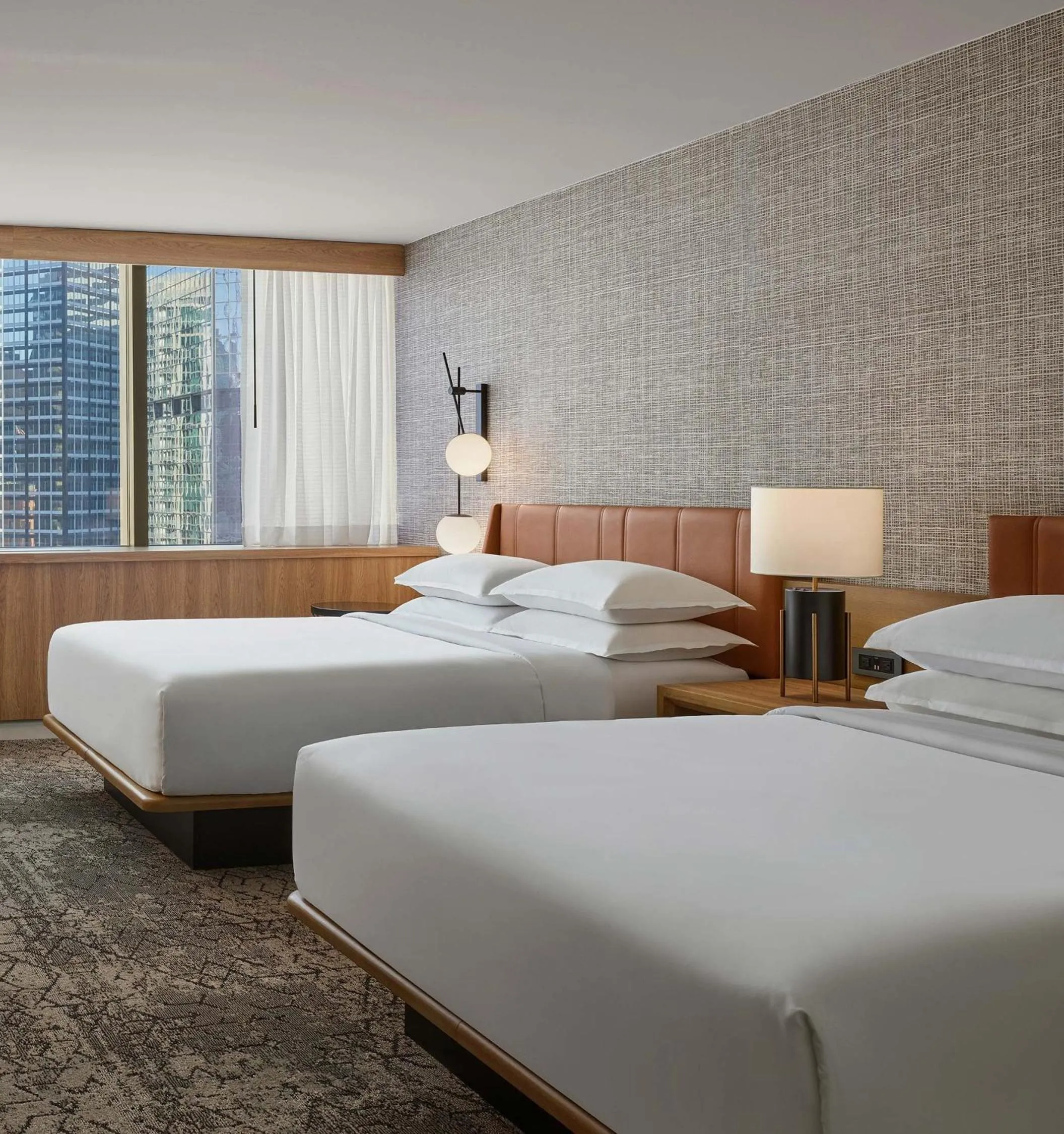 Bed in Sheraton Denver Downtown Hotel