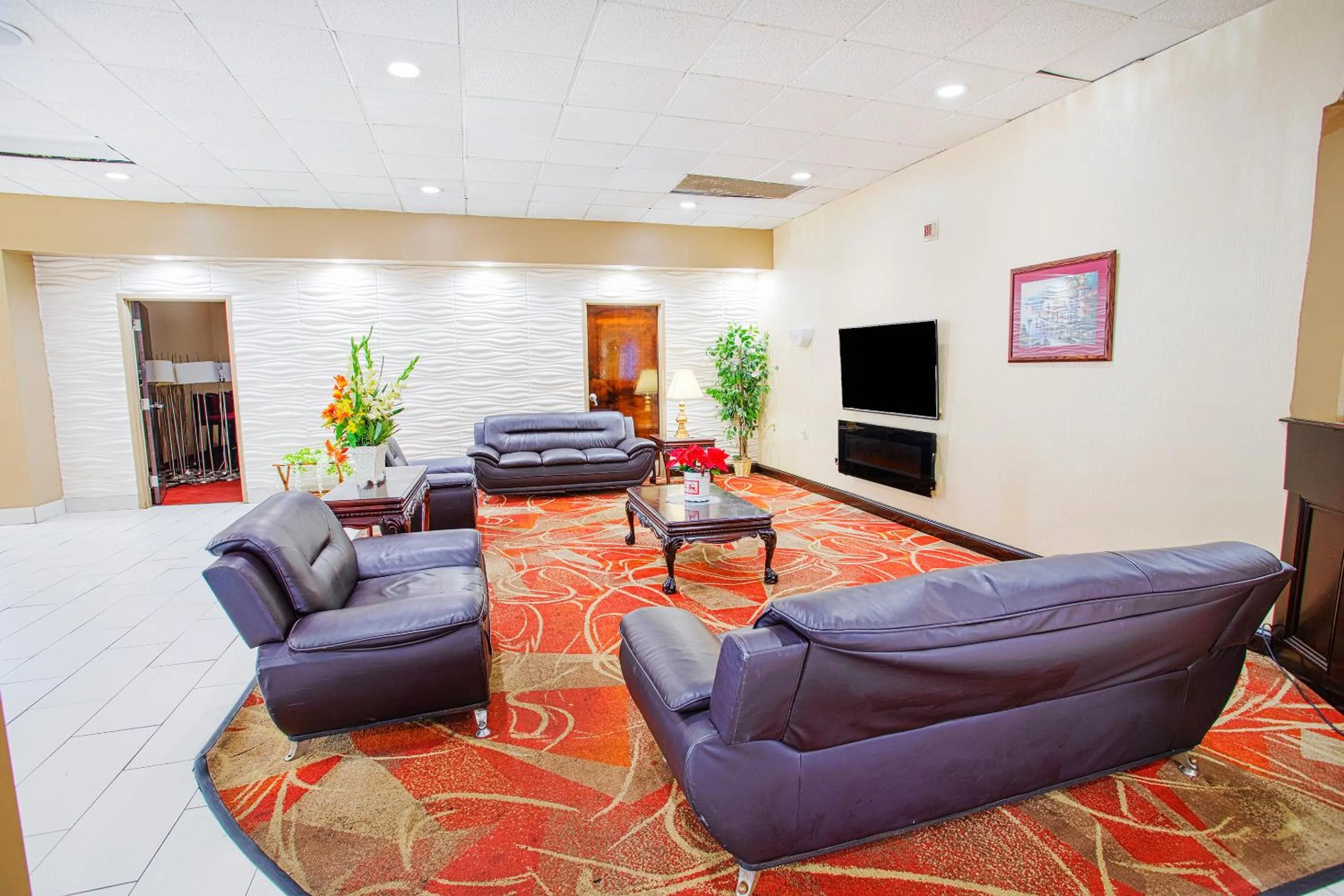 Communal lounge/ TV room in Americas Best Value Inn Winston-Salem