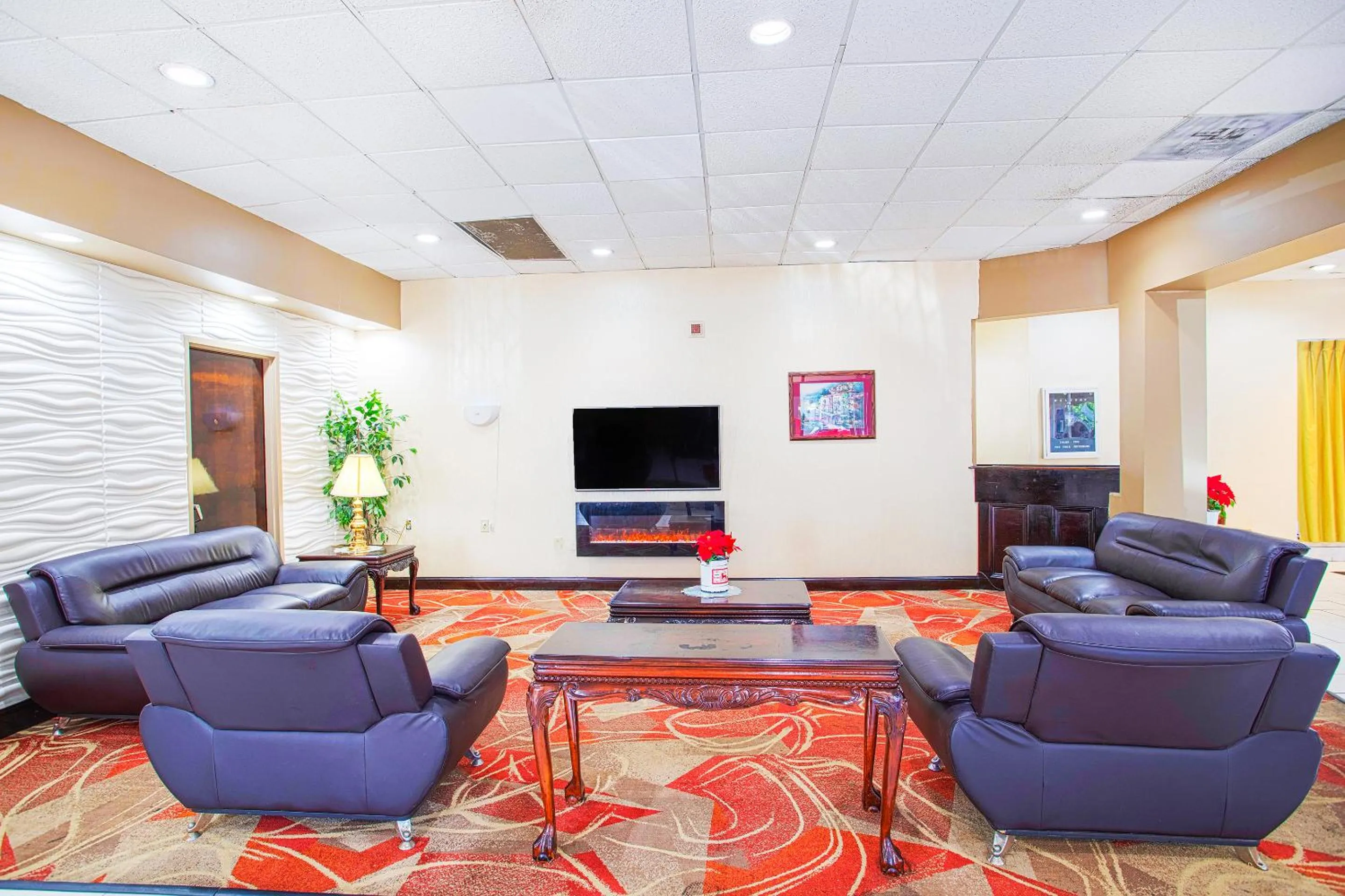 Communal lounge/ TV room in Americas Best Value Inn Winston-Salem