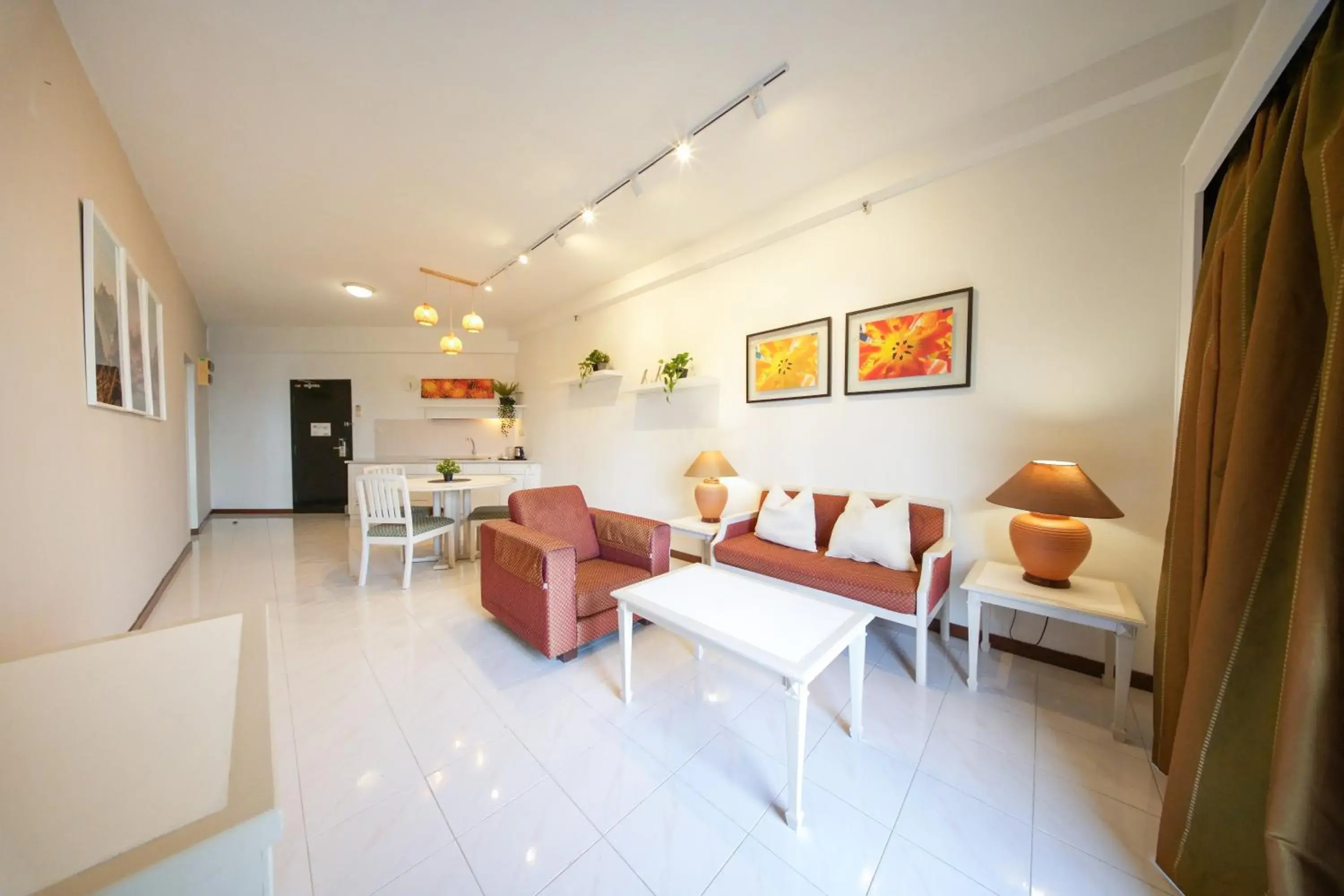 Living room in Rainbow Paradise Beach Resort Living room in Rainbow Paradise Beach Resort