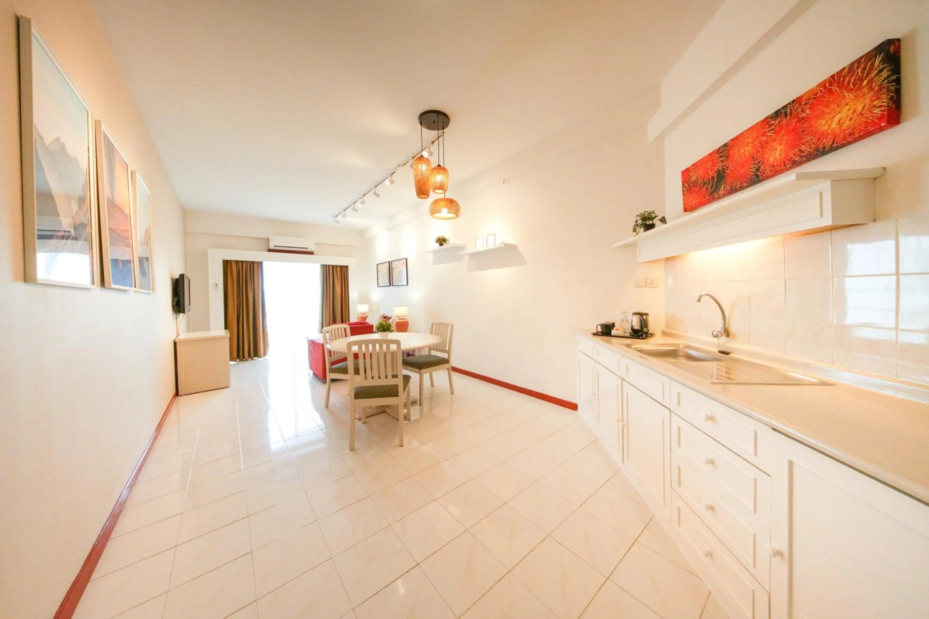 Kitchen or kitchenette in Rainbow Paradise Beach Resort