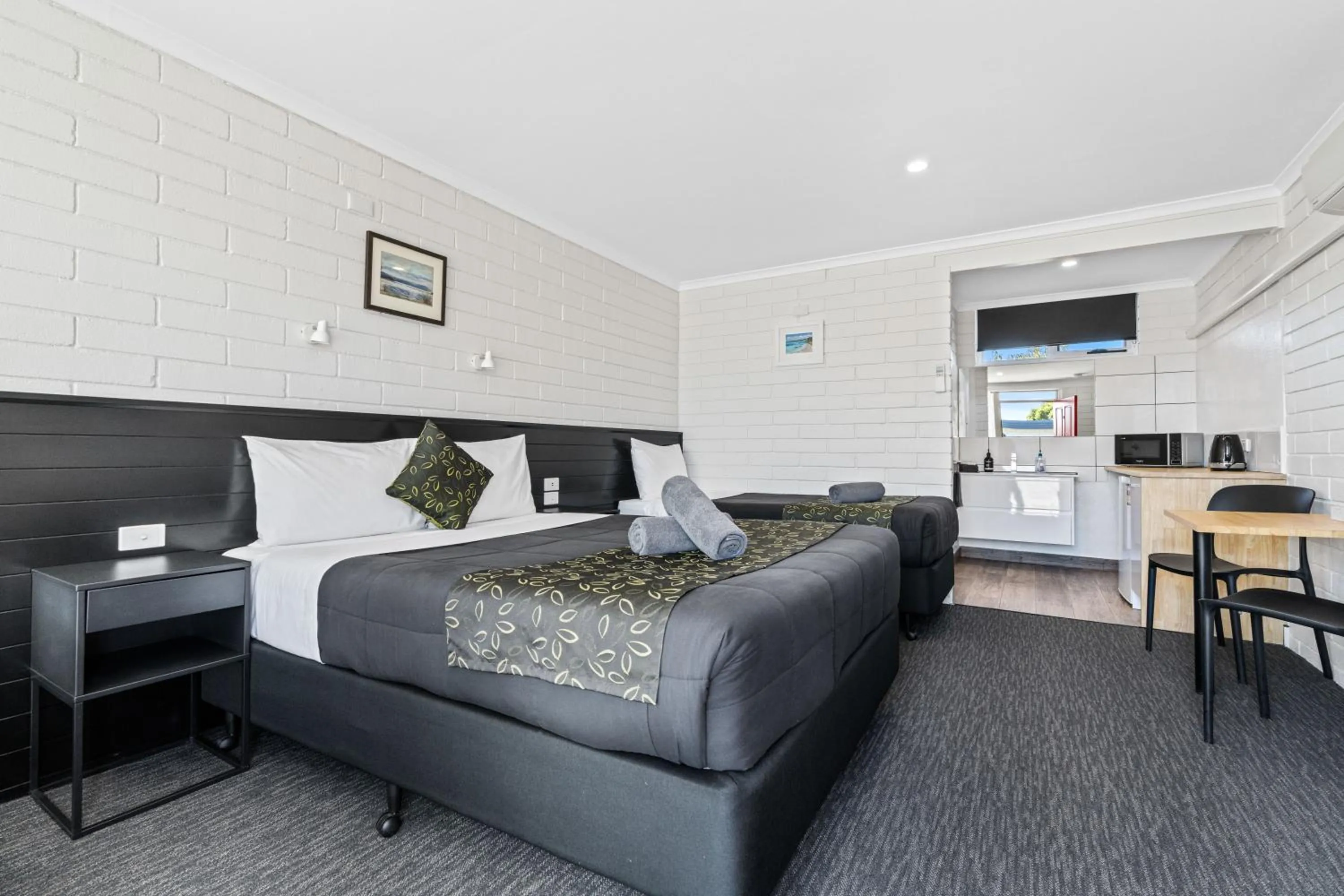 Bed in Anchor Wheel Motel