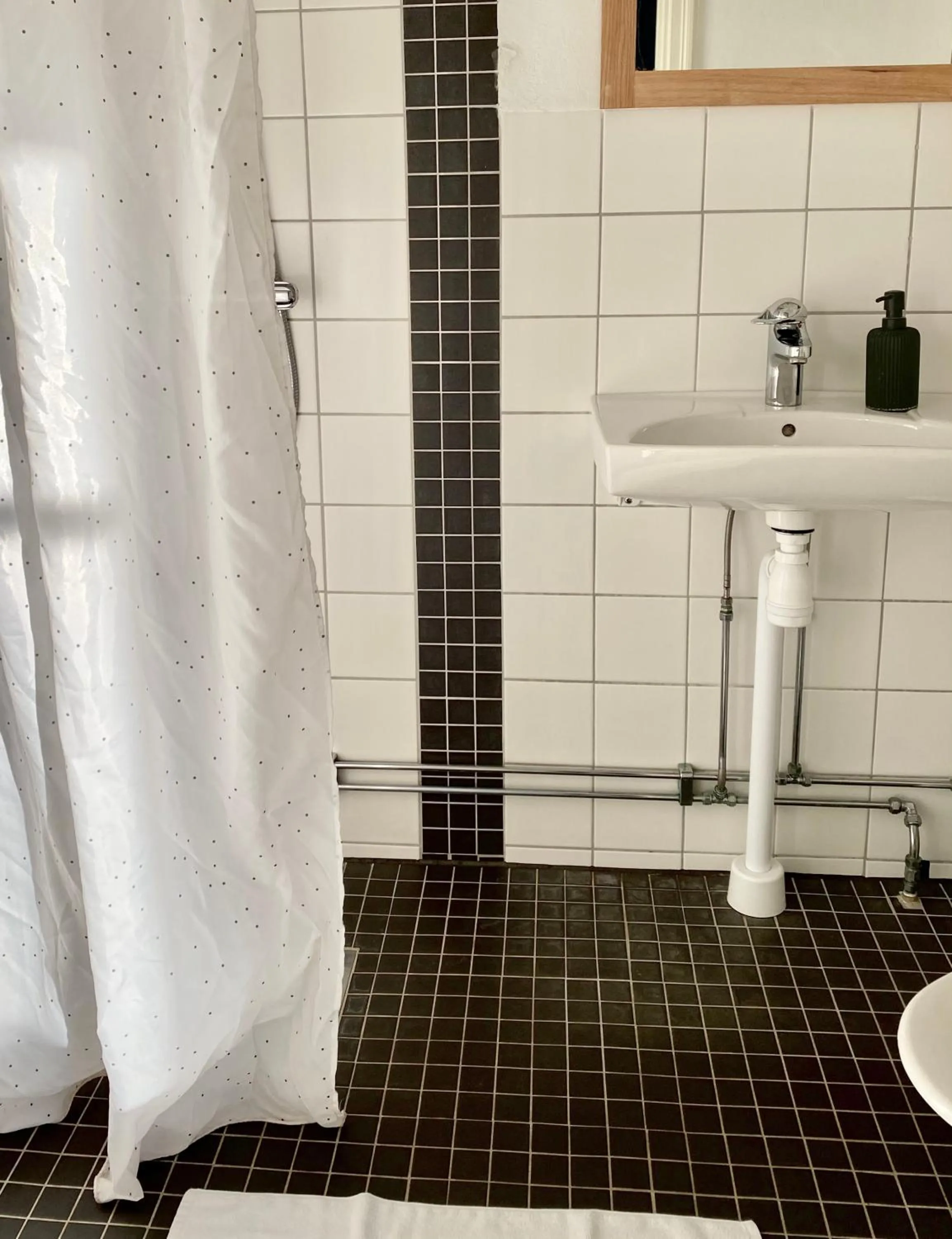 Bathroom in Kaptenshuset Hotell