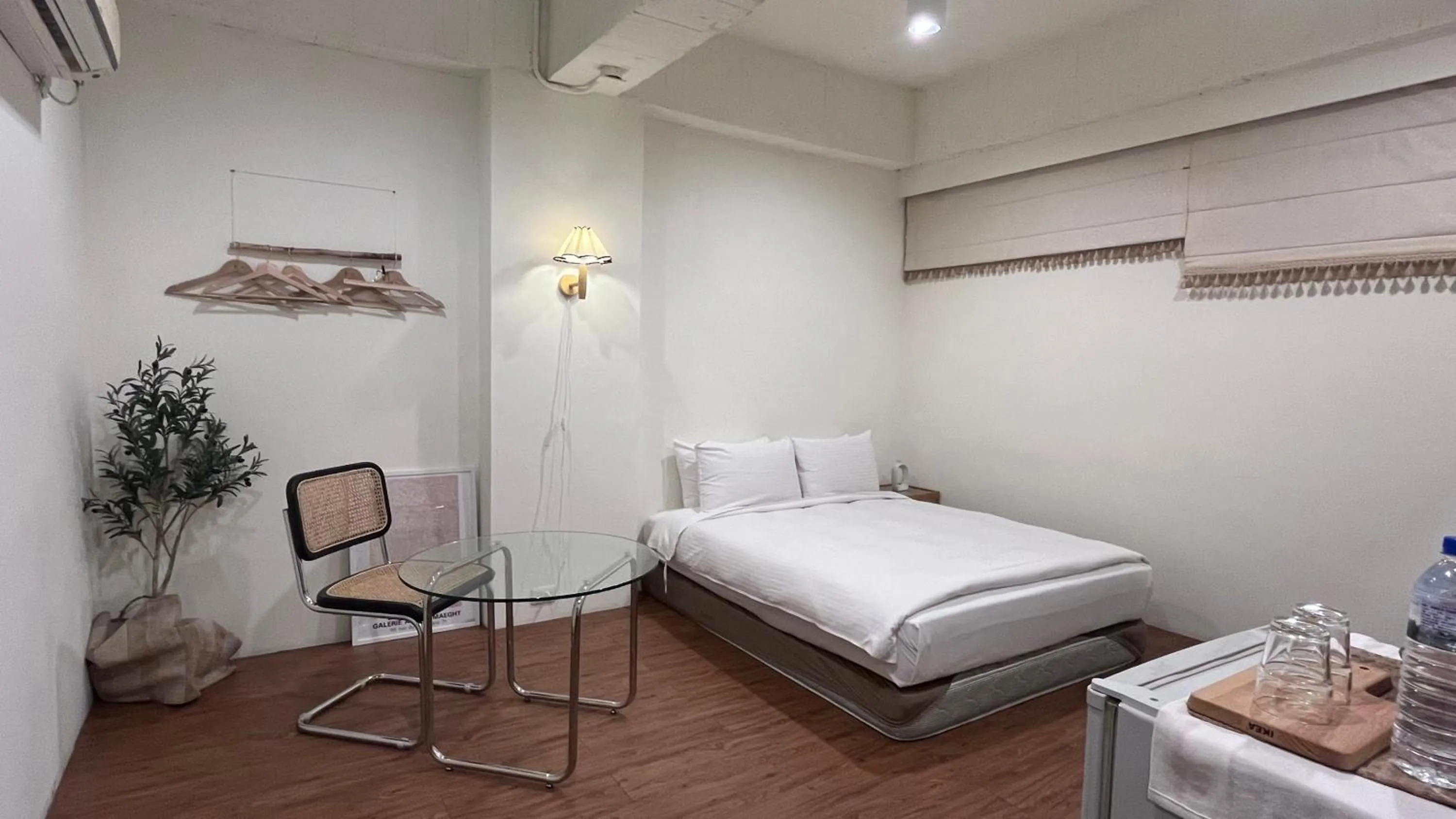 Bed in 日月潭魚池鄉秀水民宿Xiu Shui Hotel