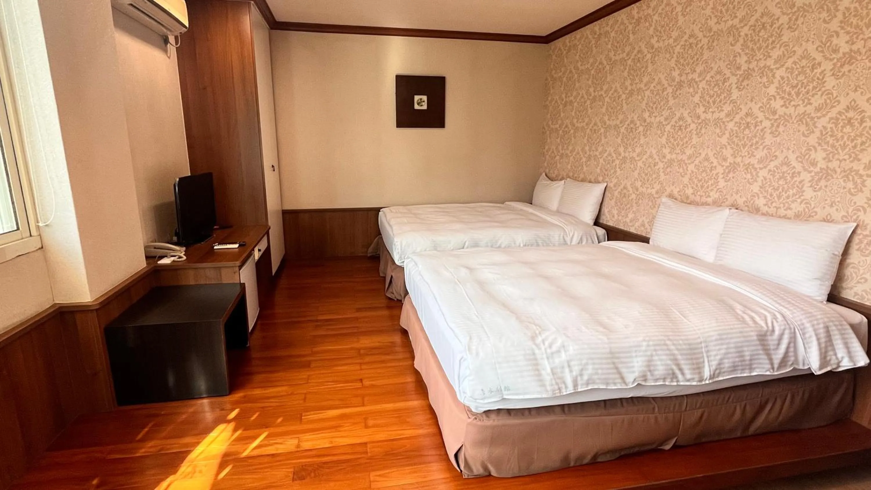 Photo of the whole room, Bed in 日月潭魚池鄉秀水民宿Xiu Shui Hotel