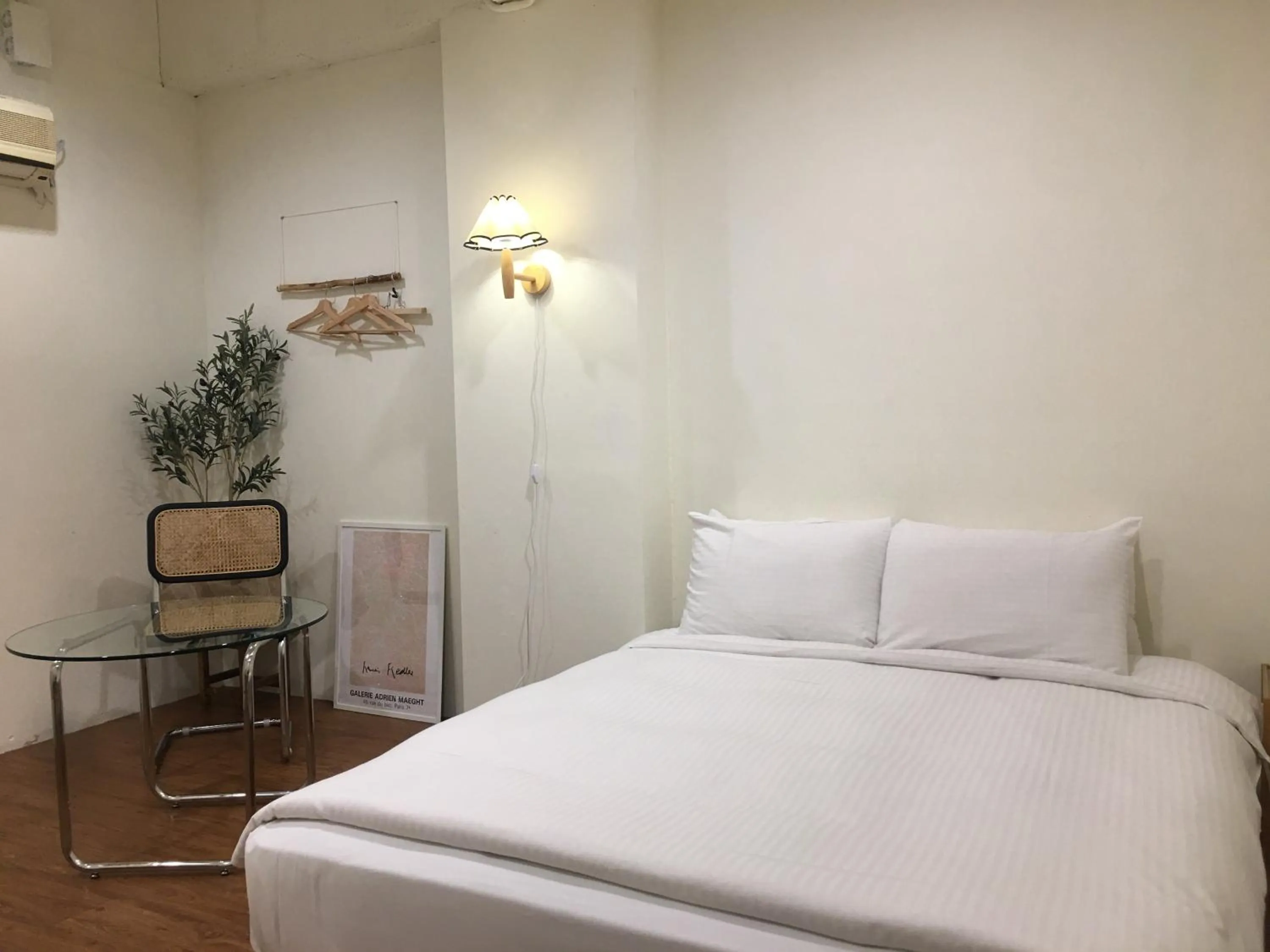 Bed in 日月潭魚池鄉秀水民宿Xiu Shui Hotel