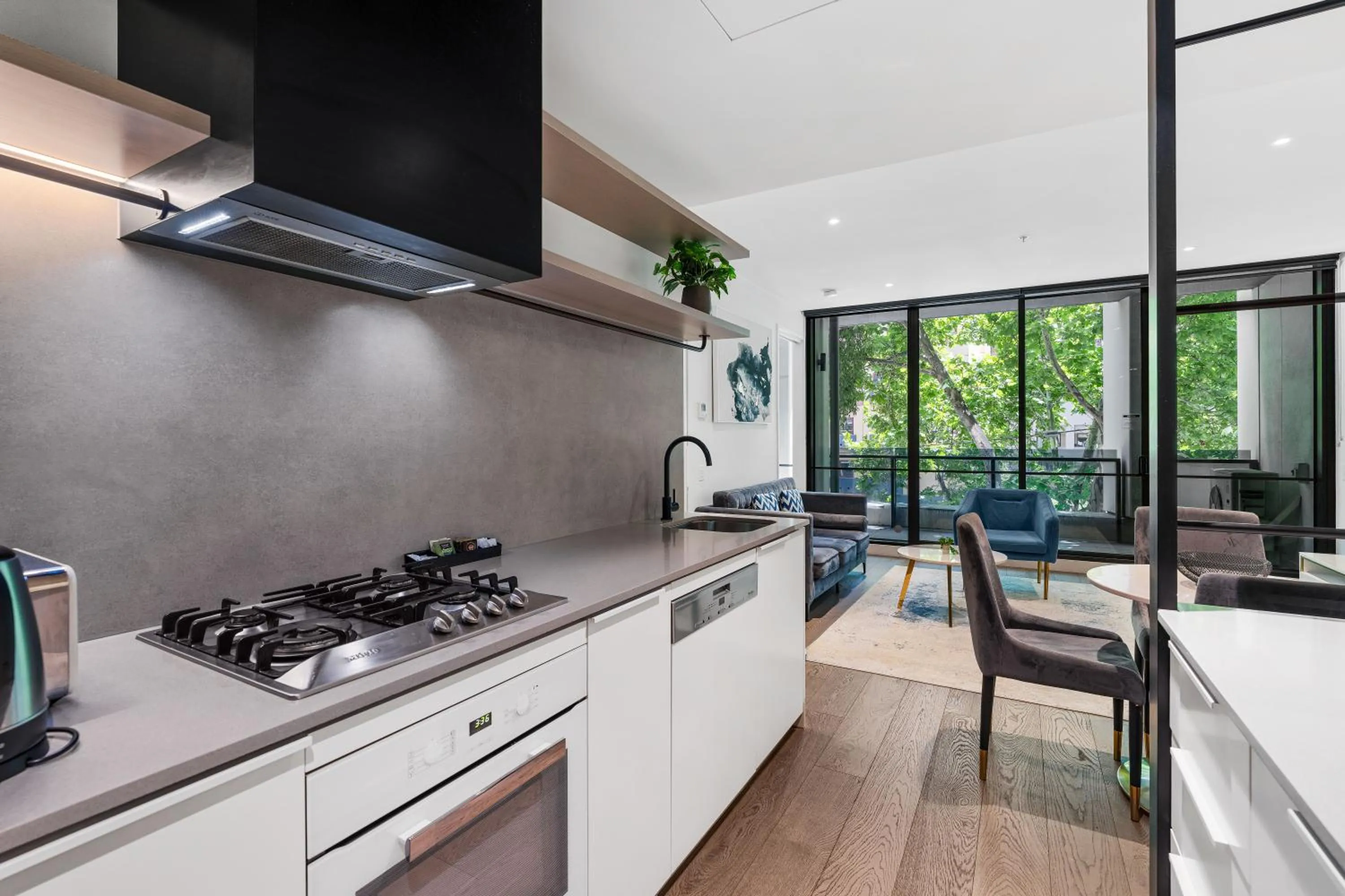 Kitchen or kitchenette in The Eminence Apartments by CLLIX