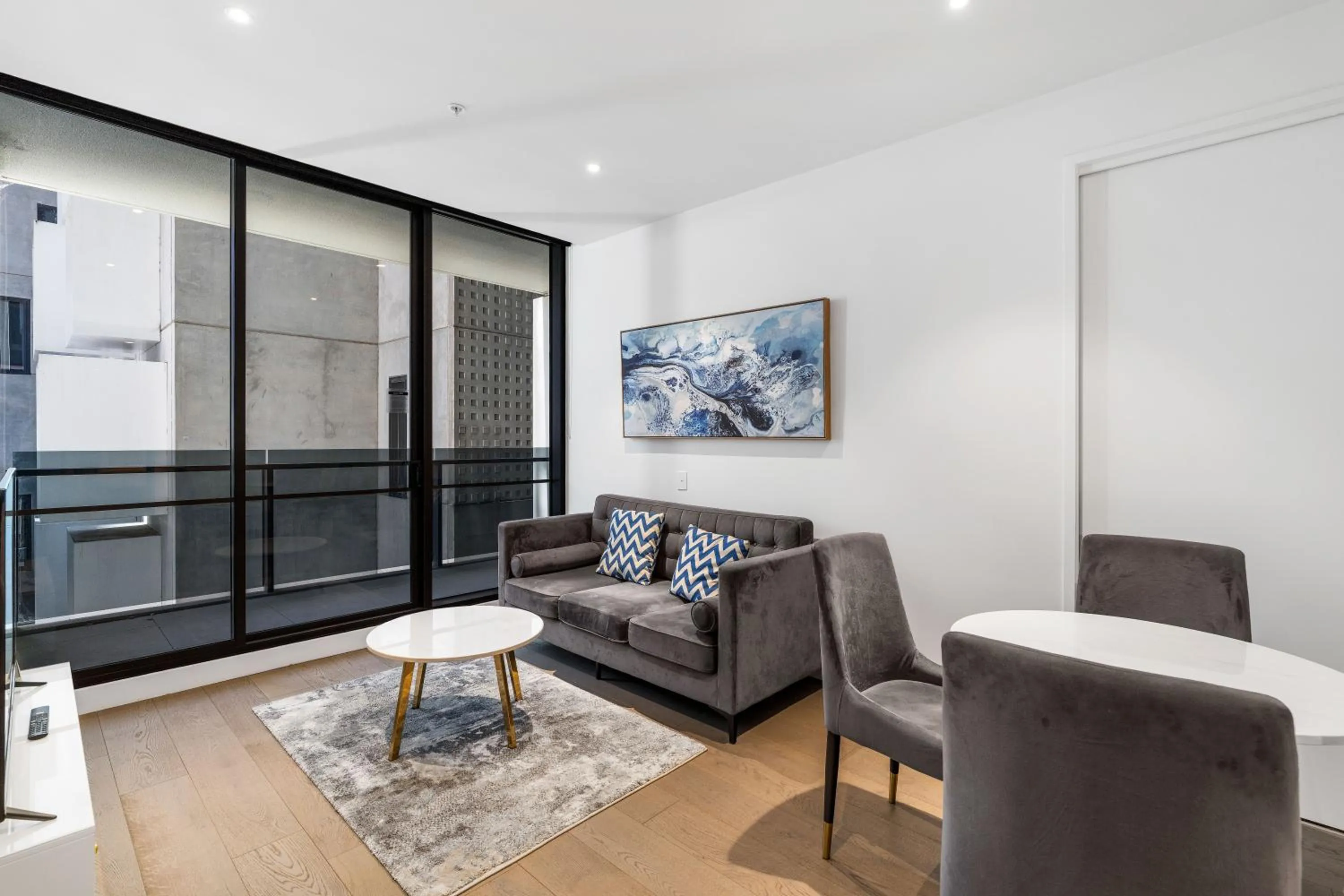 Living room in The Eminence Apartments by CLLIX