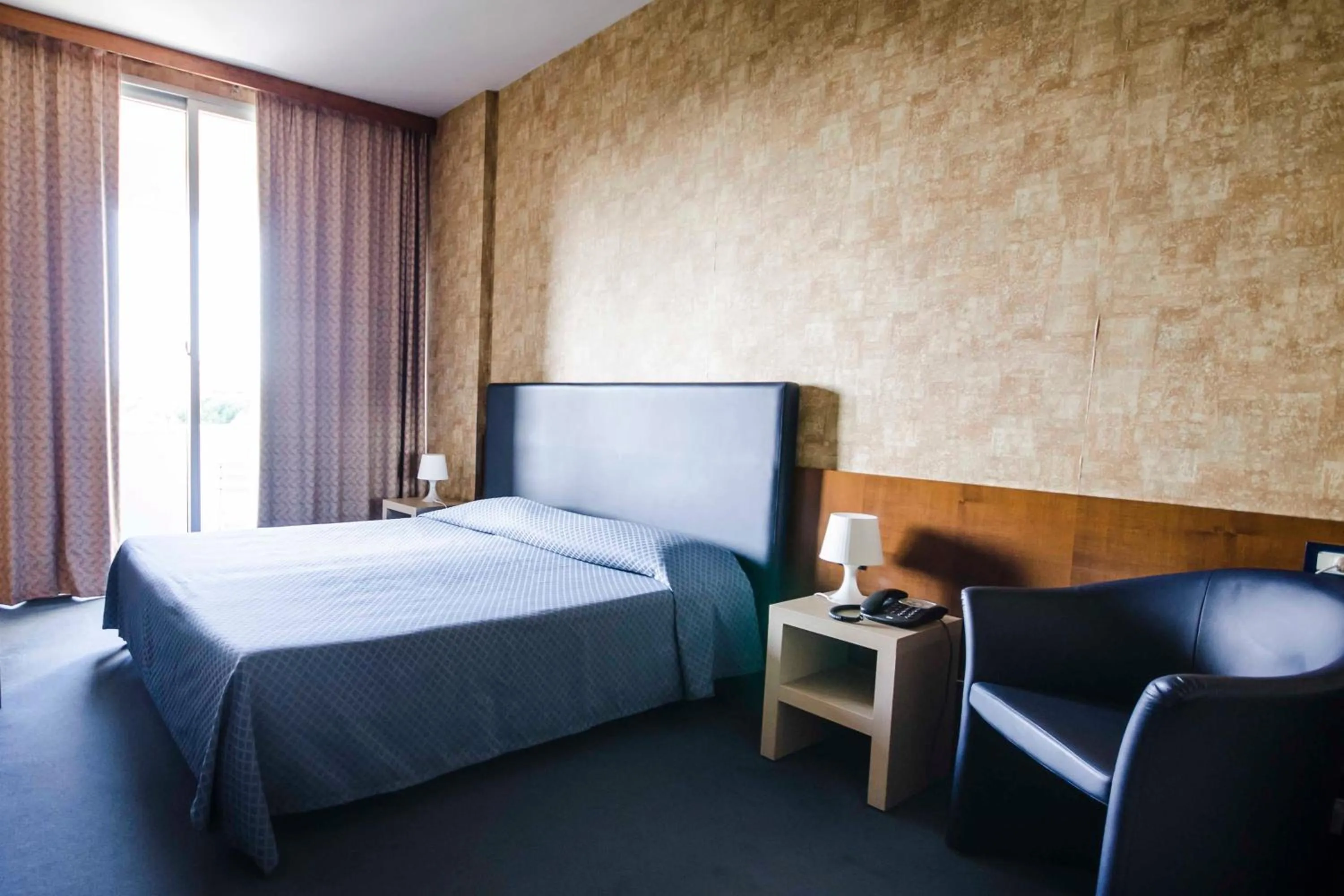 Photo of the whole room, Bed in Grand Hotel Helios