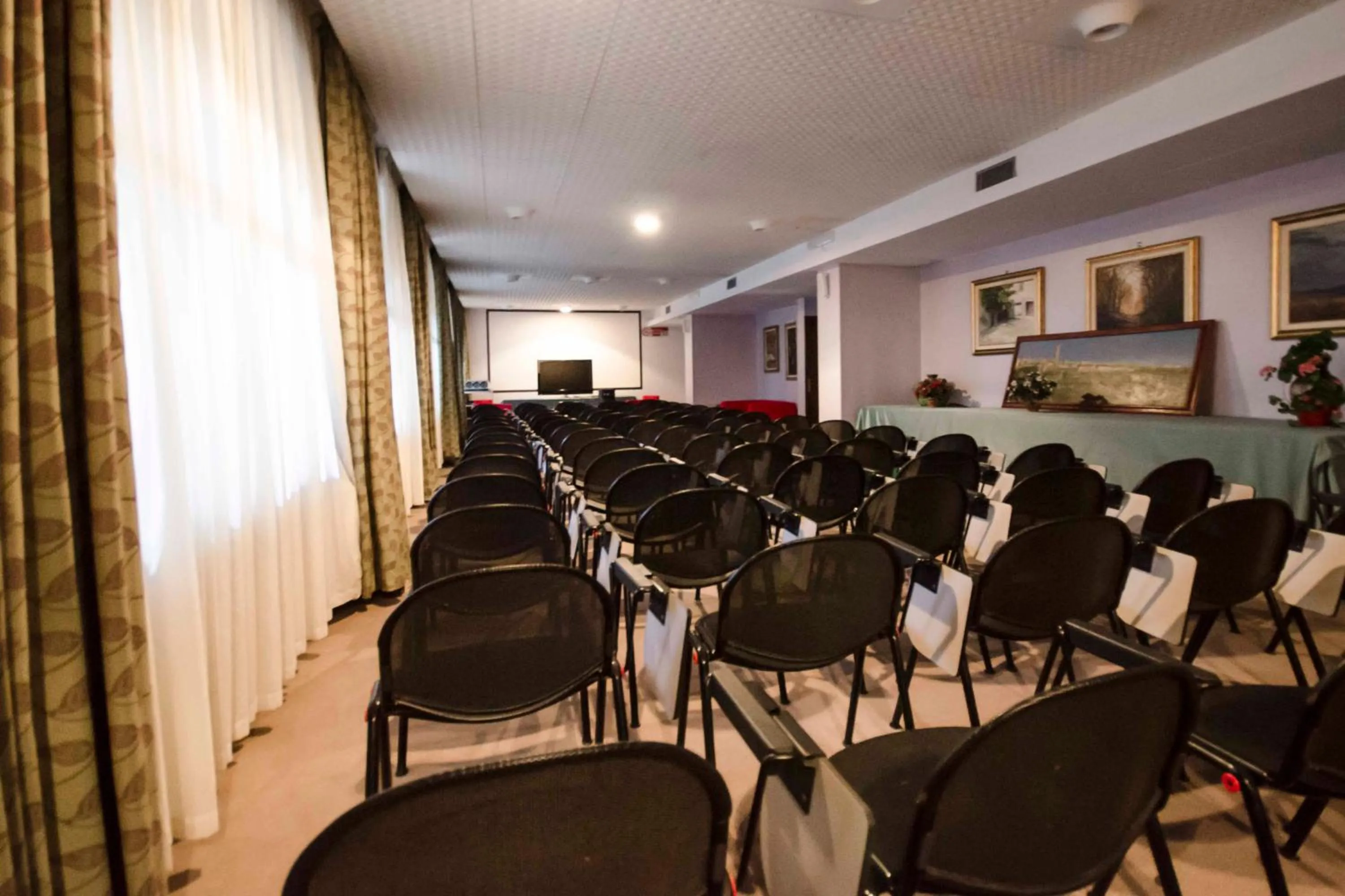 Communal lounge/ TV room in Grand Hotel Helios