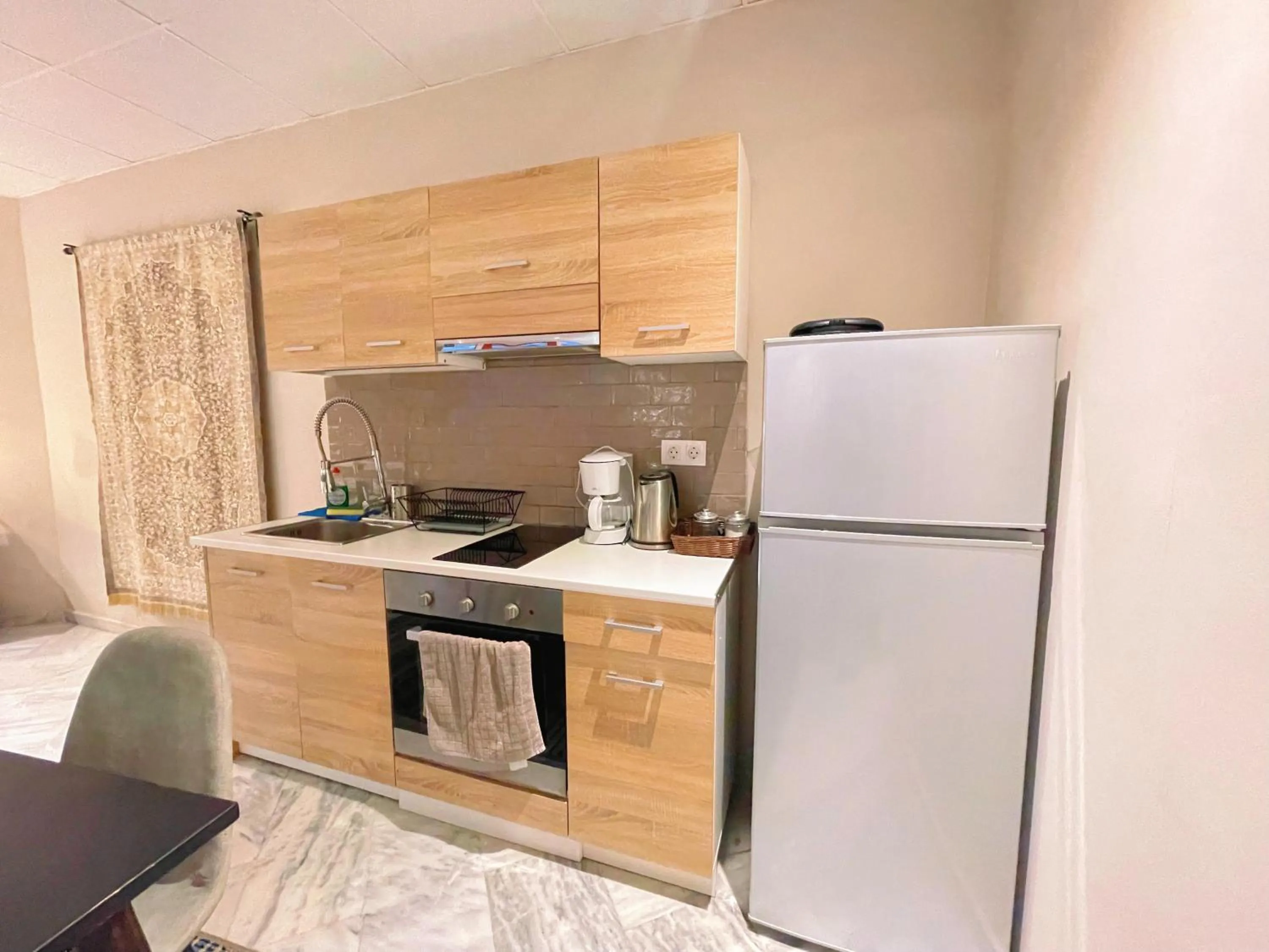 Kitchen or kitchenette in WSD Baia Acropolis Hotel Apartment