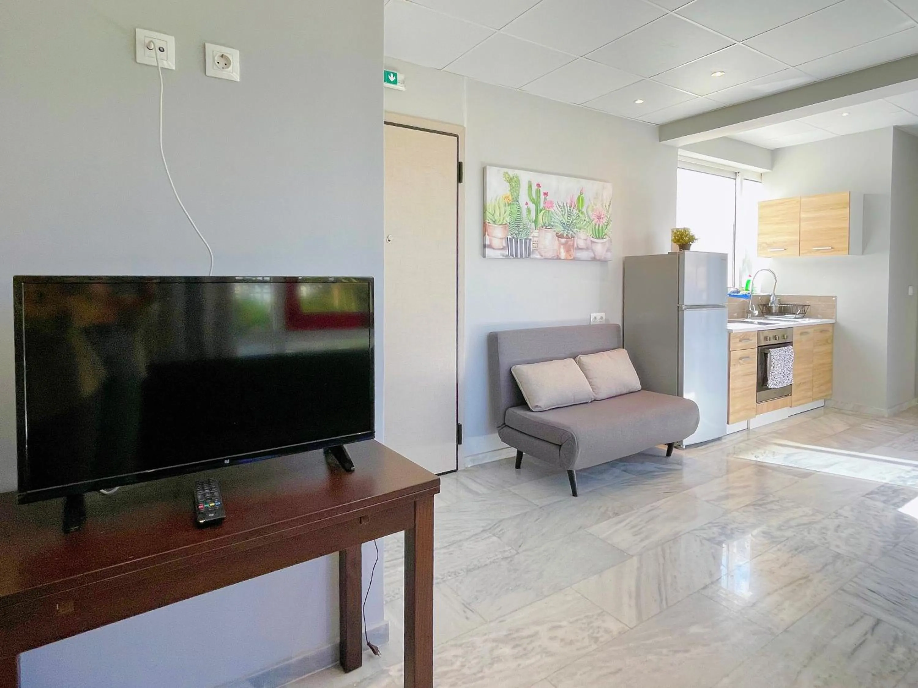 Living room in WSD Baia Acropolis Hotel Apartment