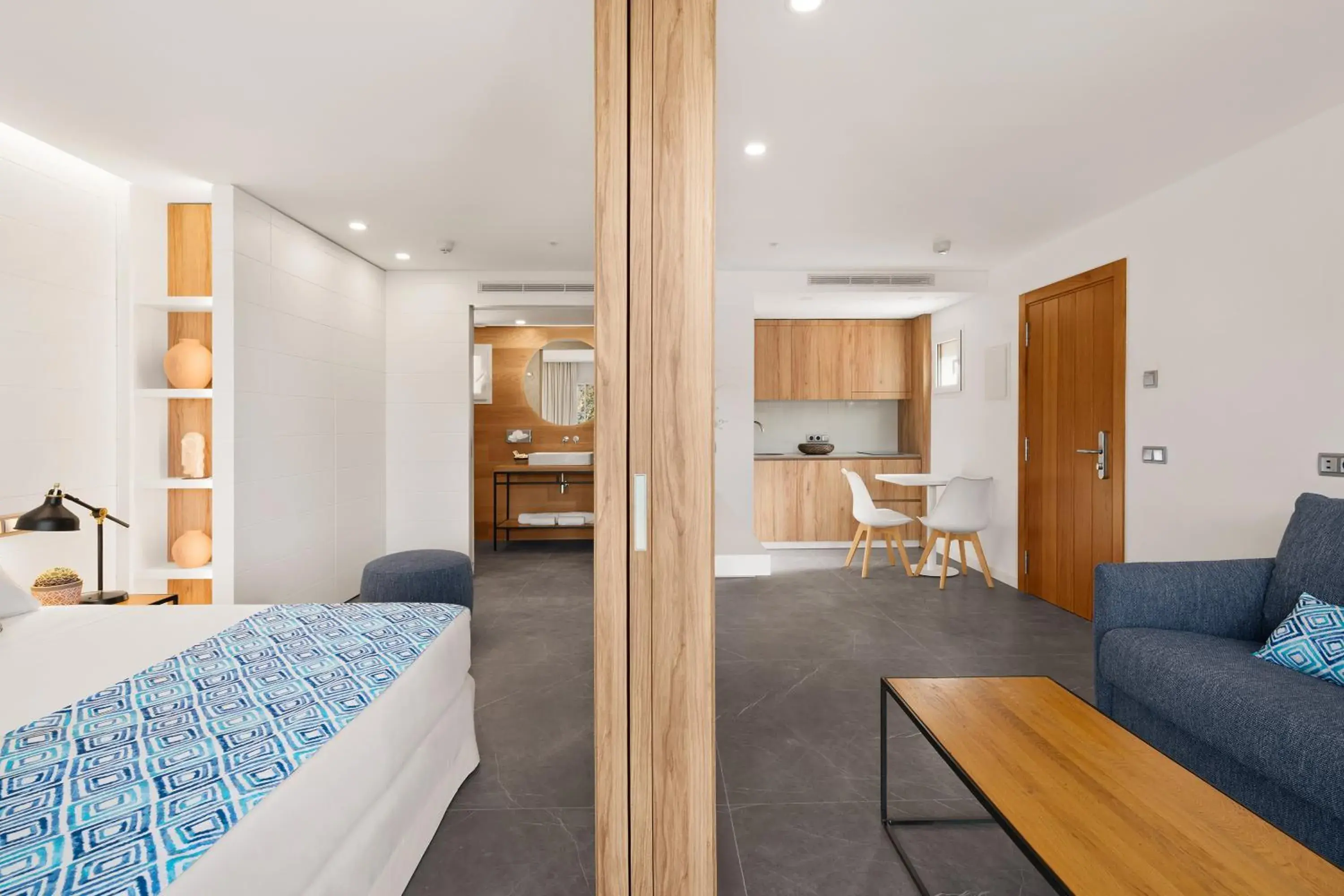 Living room, Bed in Bahia Suites Camp de Mar Living room, Bed in Bahia Suites Camp de Mar