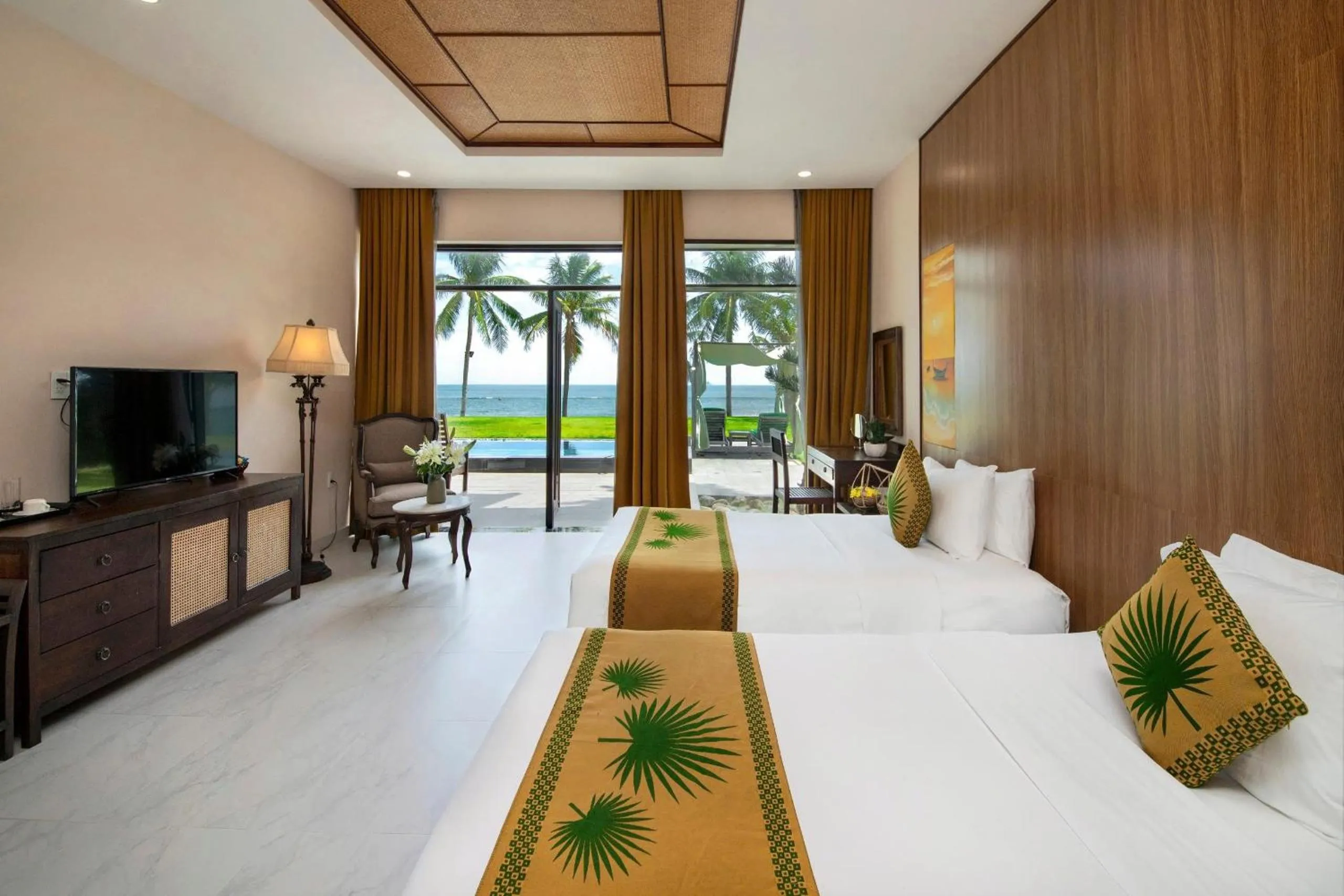 Bed in Palm Garden Beach Resort & Spa
