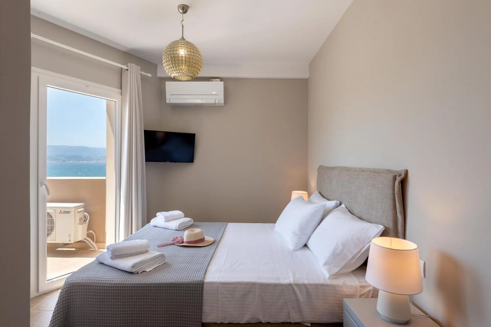 Photo of the whole room, Bed in Egialion Iqia