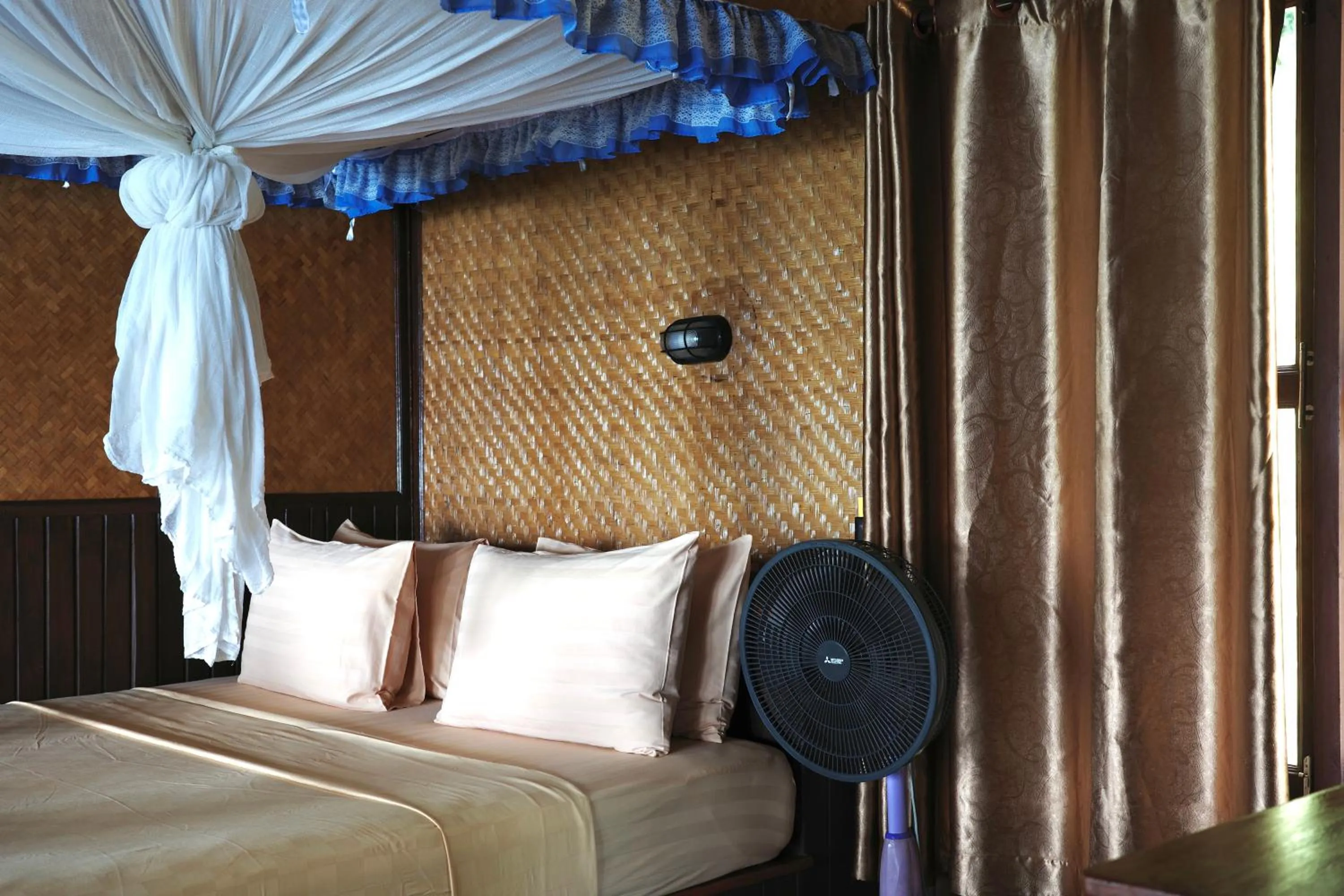 Bed in Phi Phi Relax Beach Resort