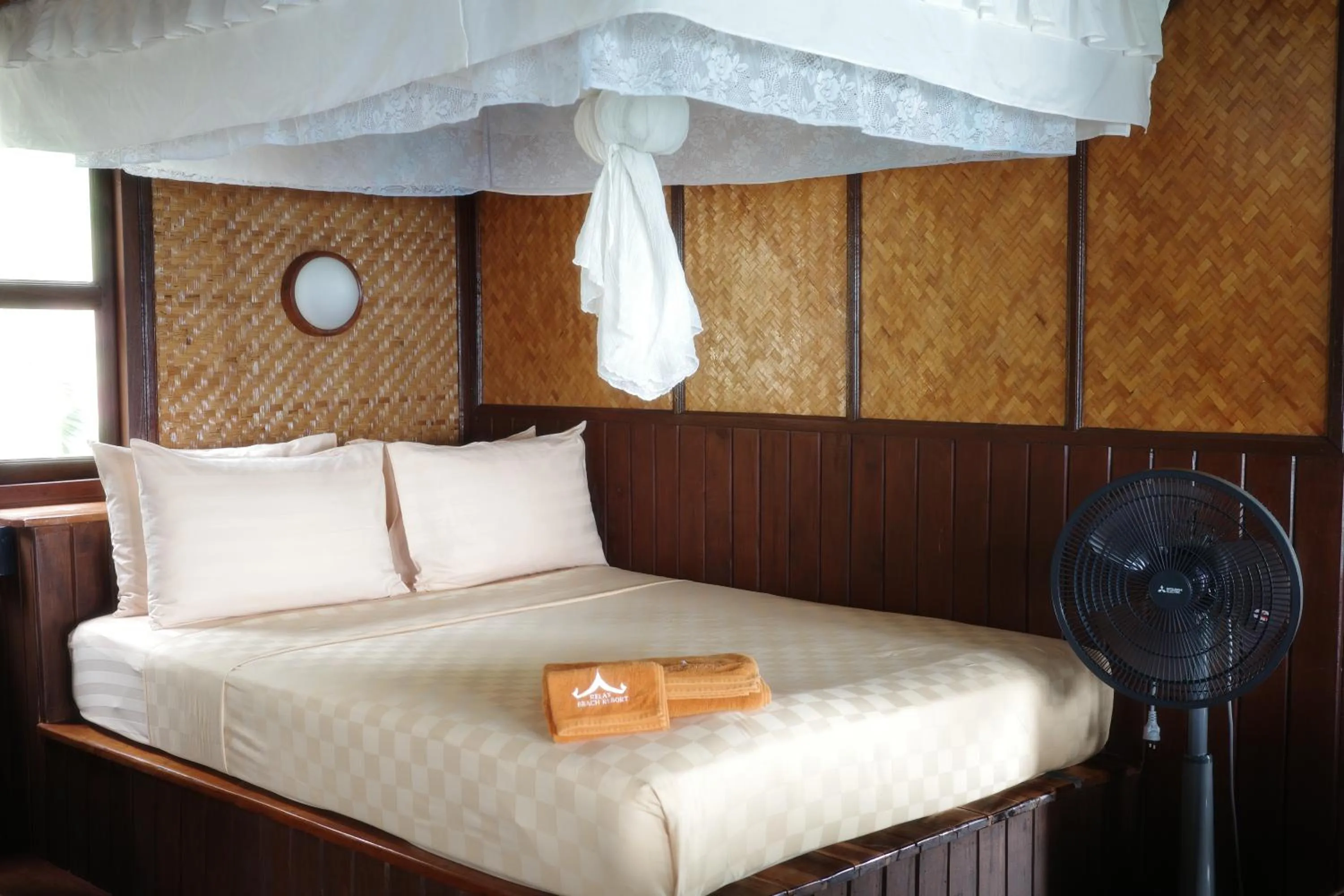 Bed in Phi Phi Relax Beach Resort