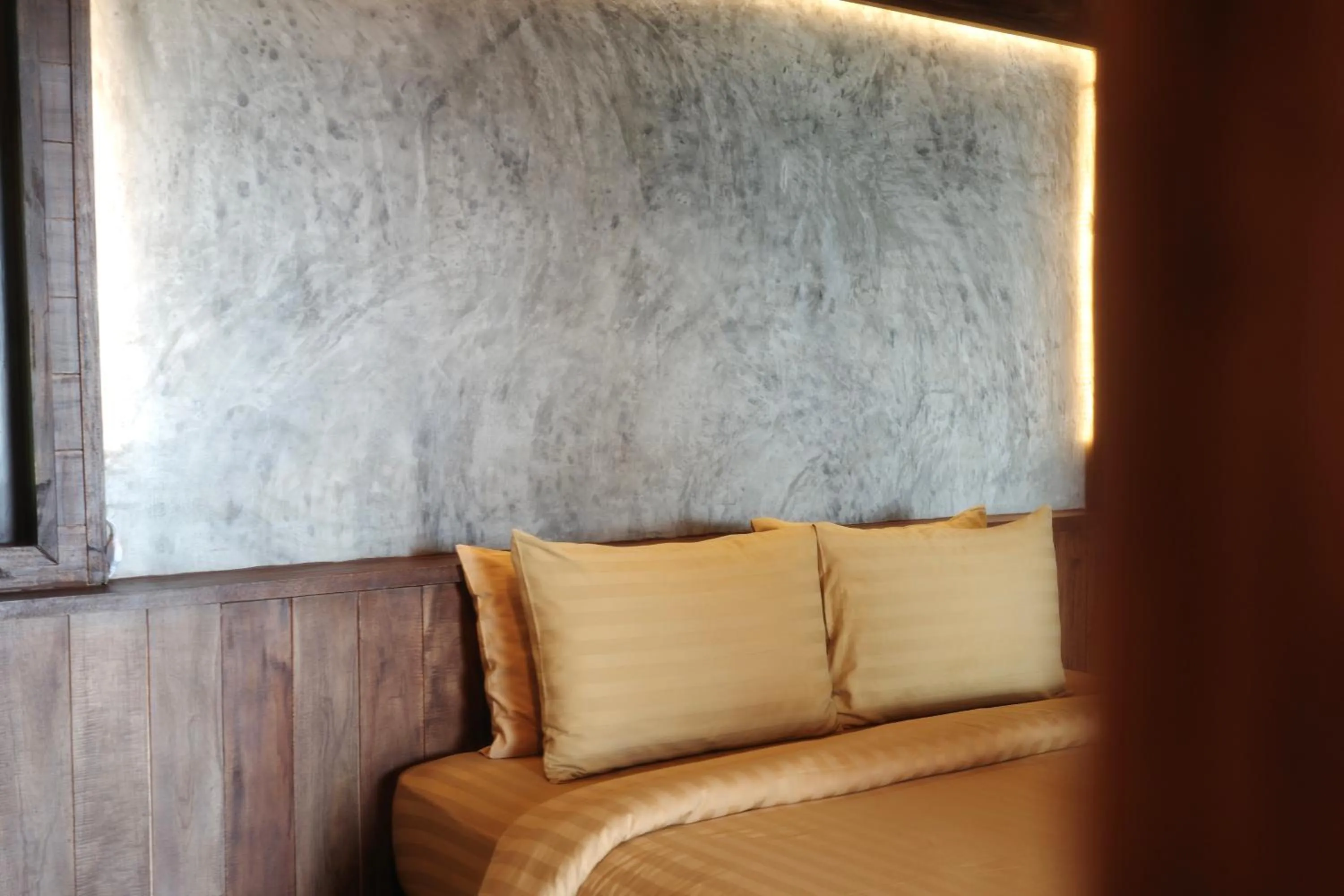 Bed in Phi Phi Relax Beach Resort