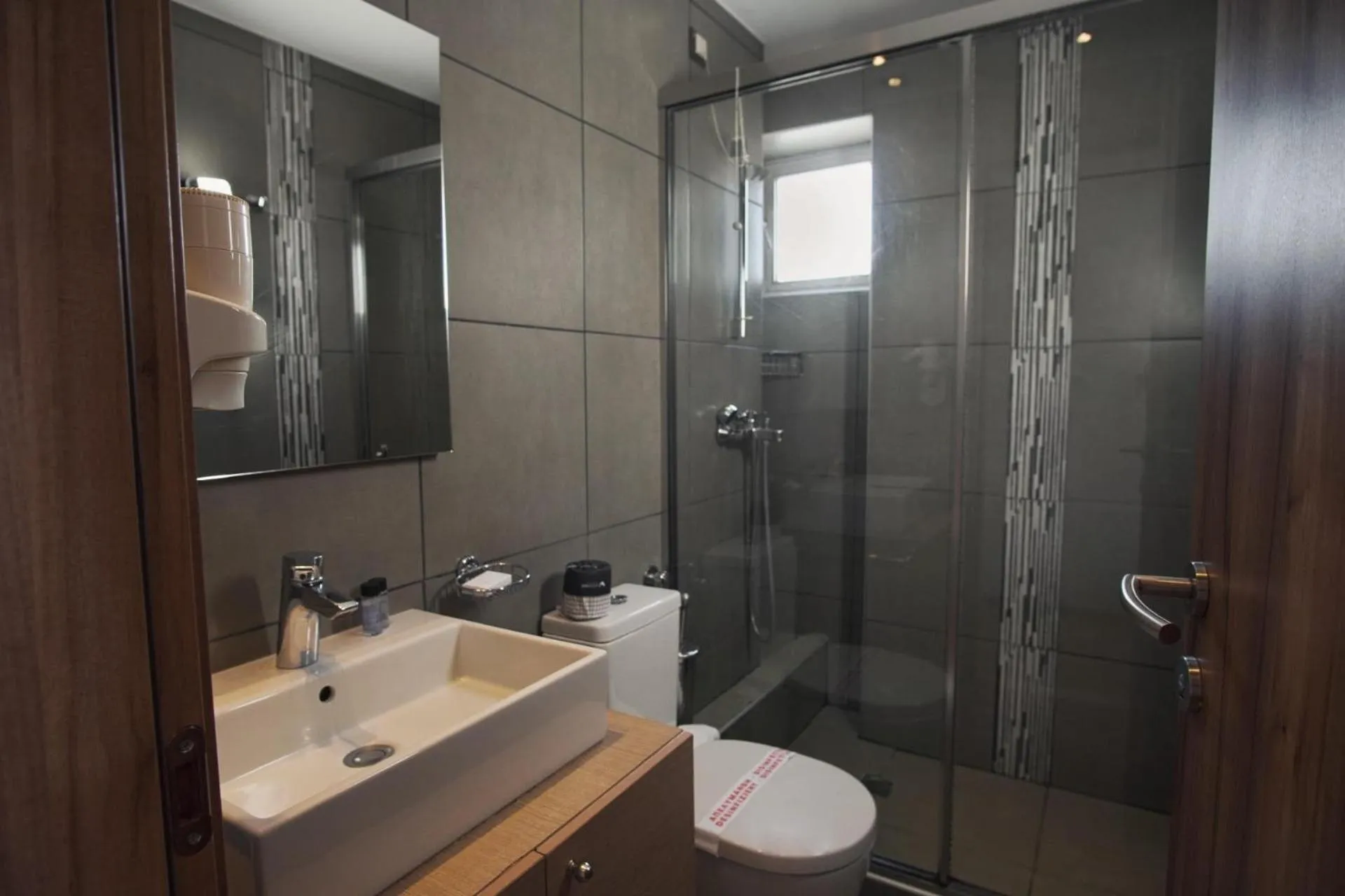 Bathroom in Elements Rooms & Apartments