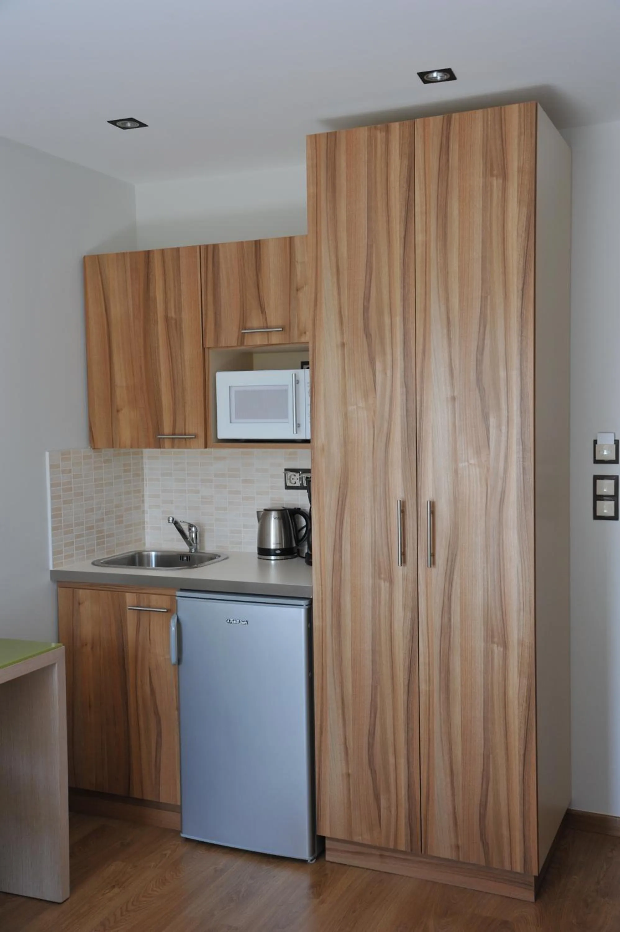 Kitchen or kitchenette in Elements Rooms & Apartments