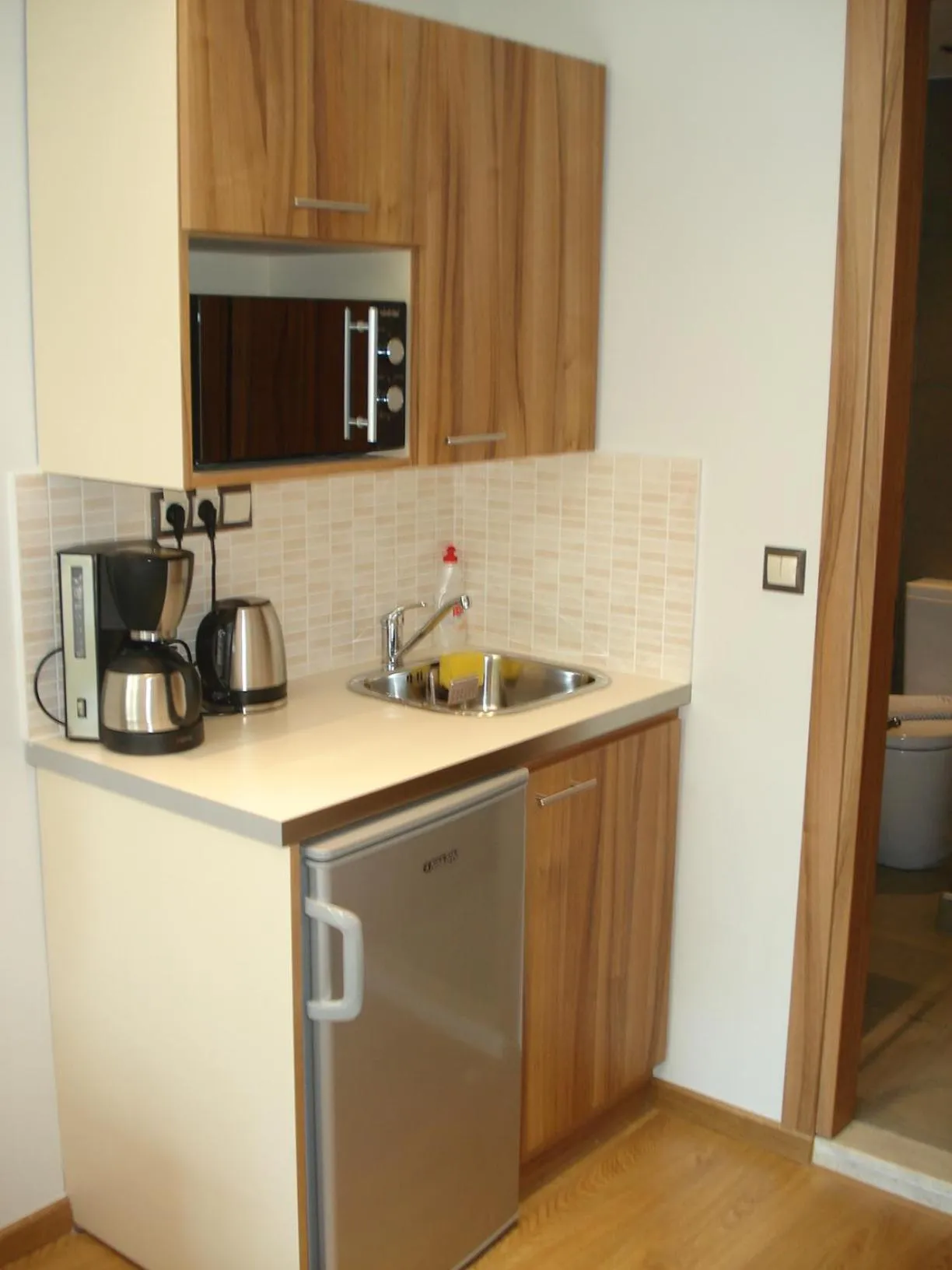 Kitchen or kitchenette in Elements Rooms & Apartments