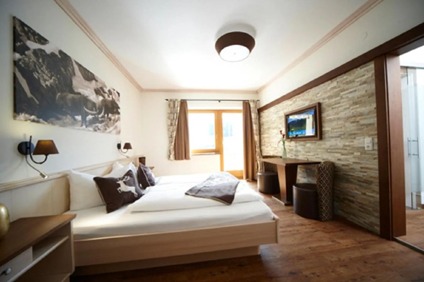 Photo of the whole room, Bed in Hotel Gasthof Perauer