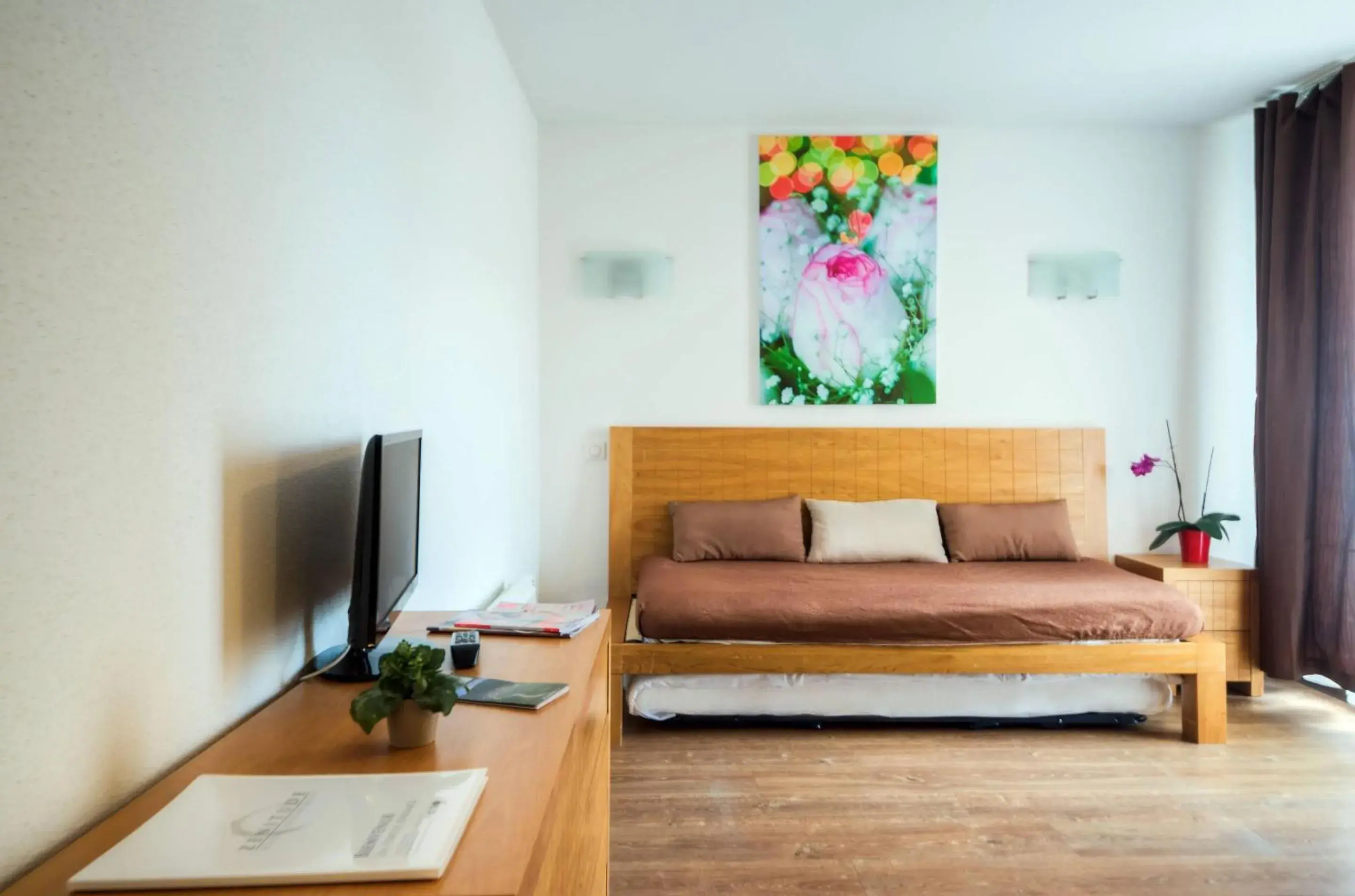 Bedroom in Comfort Aparthotel Mutzig Portes d'Alsace Bedroom in Comfort Aparthotel Mutzig Portes d'Alsace