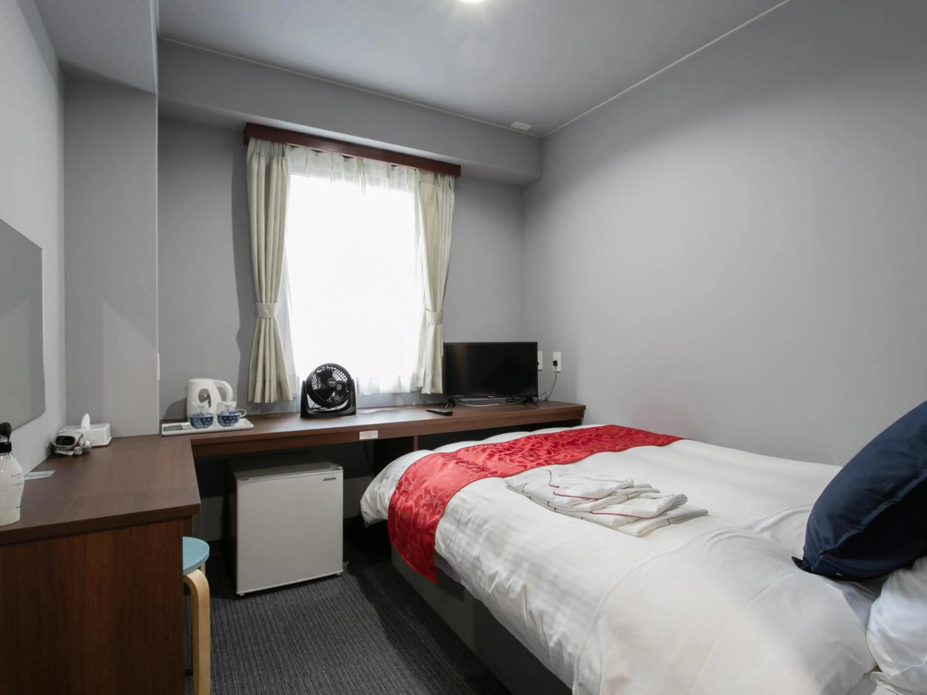 Bed in Tabist Sasebo Palace Hotel