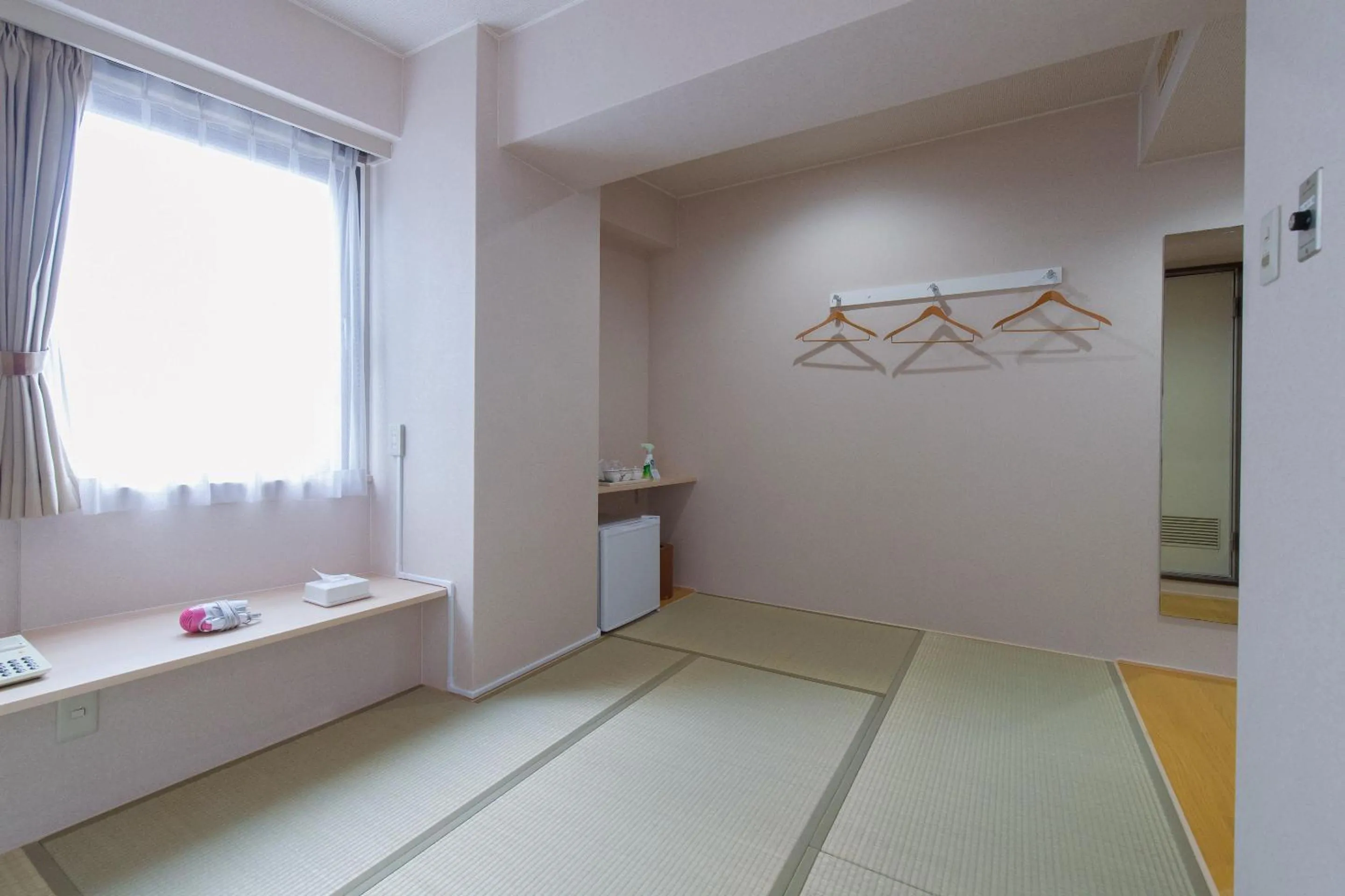 Bed in Tabist Sasebo Palace Hotel