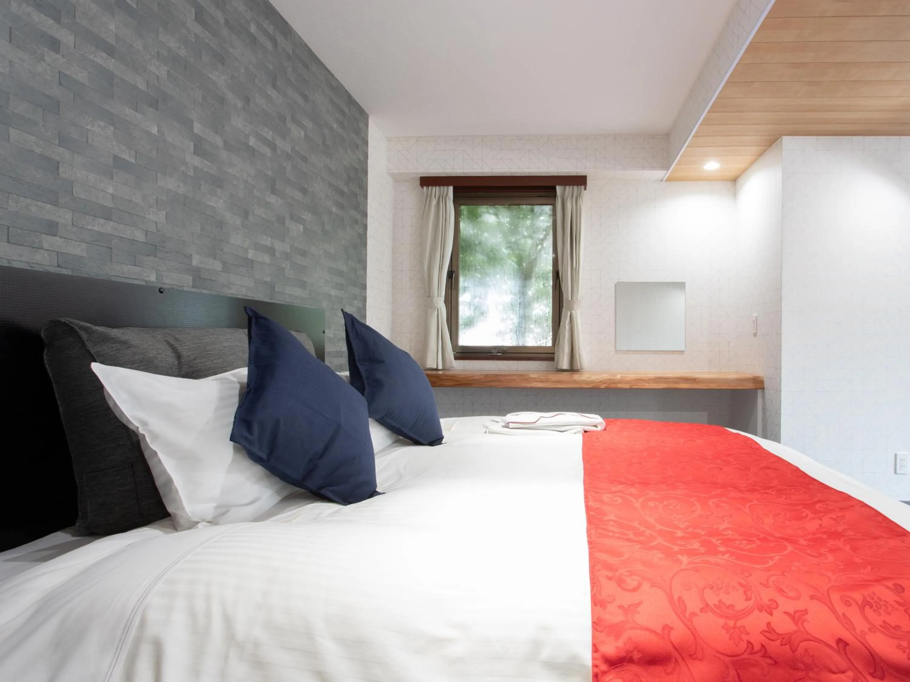 Bed in Tabist Sasebo Palace Hotel