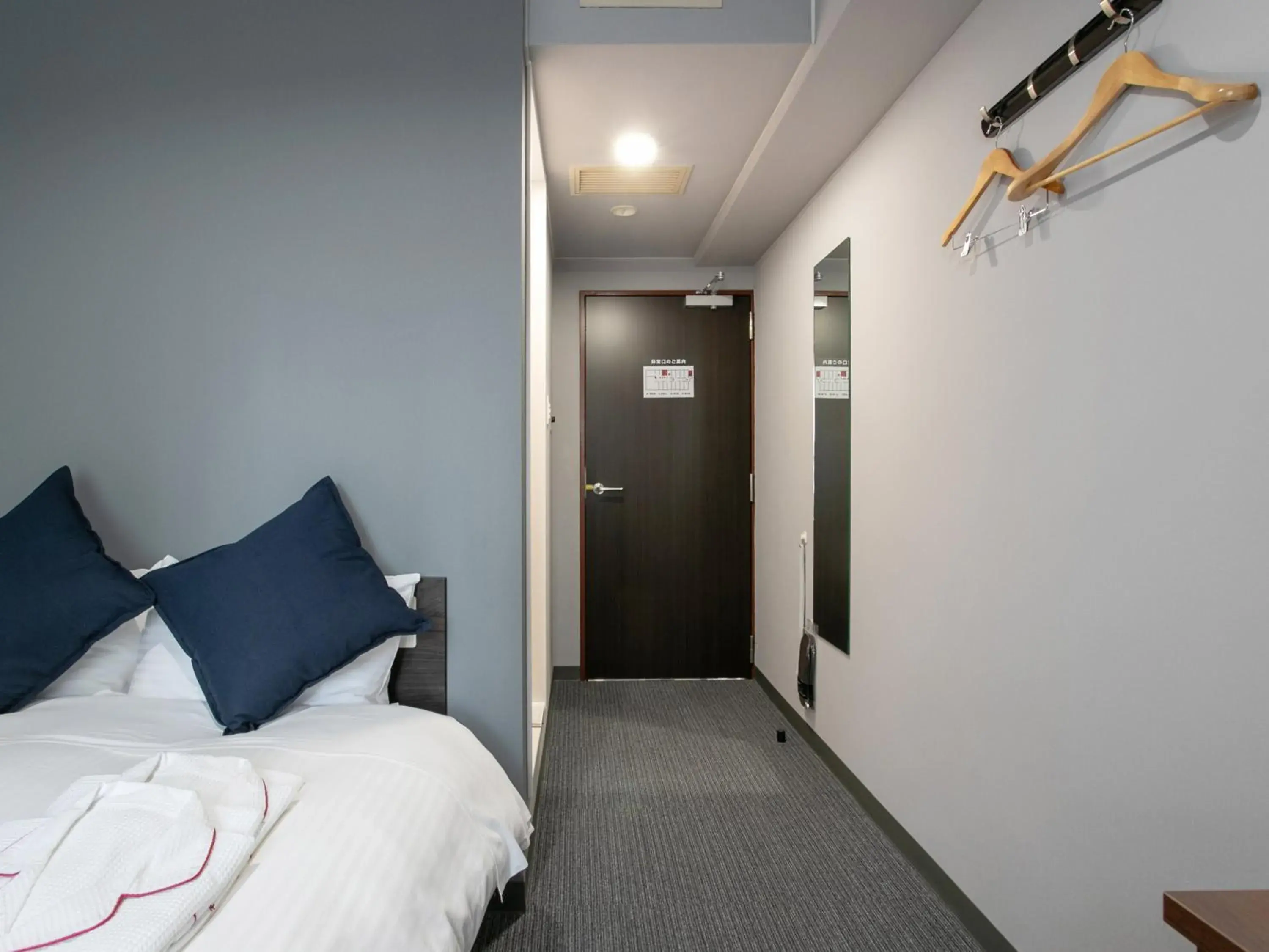 Bed in Tabist Sasebo Palace Hotel Bed in Tabist Sasebo Palace Hotel