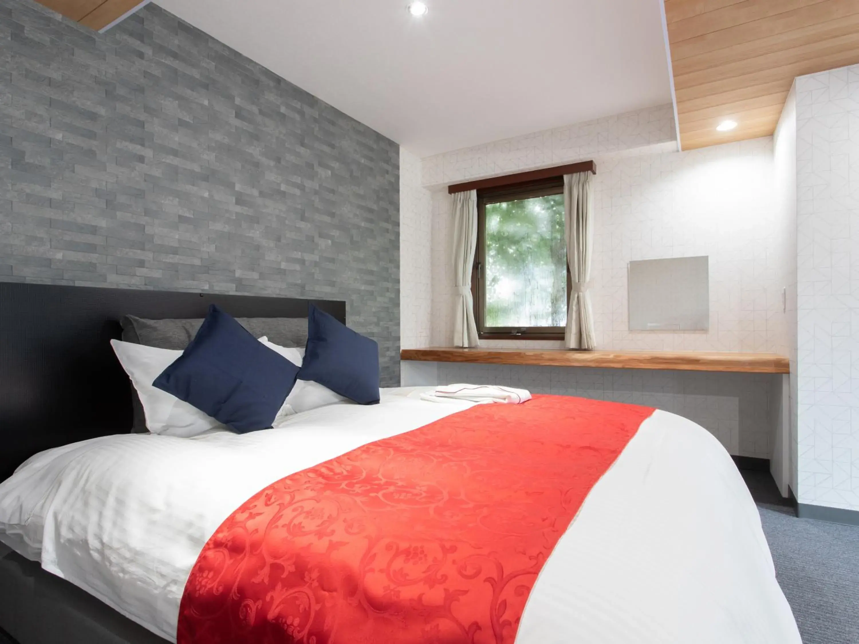 Bed in Tabist Sasebo Palace Hotel Bed in Tabist Sasebo Palace Hotel