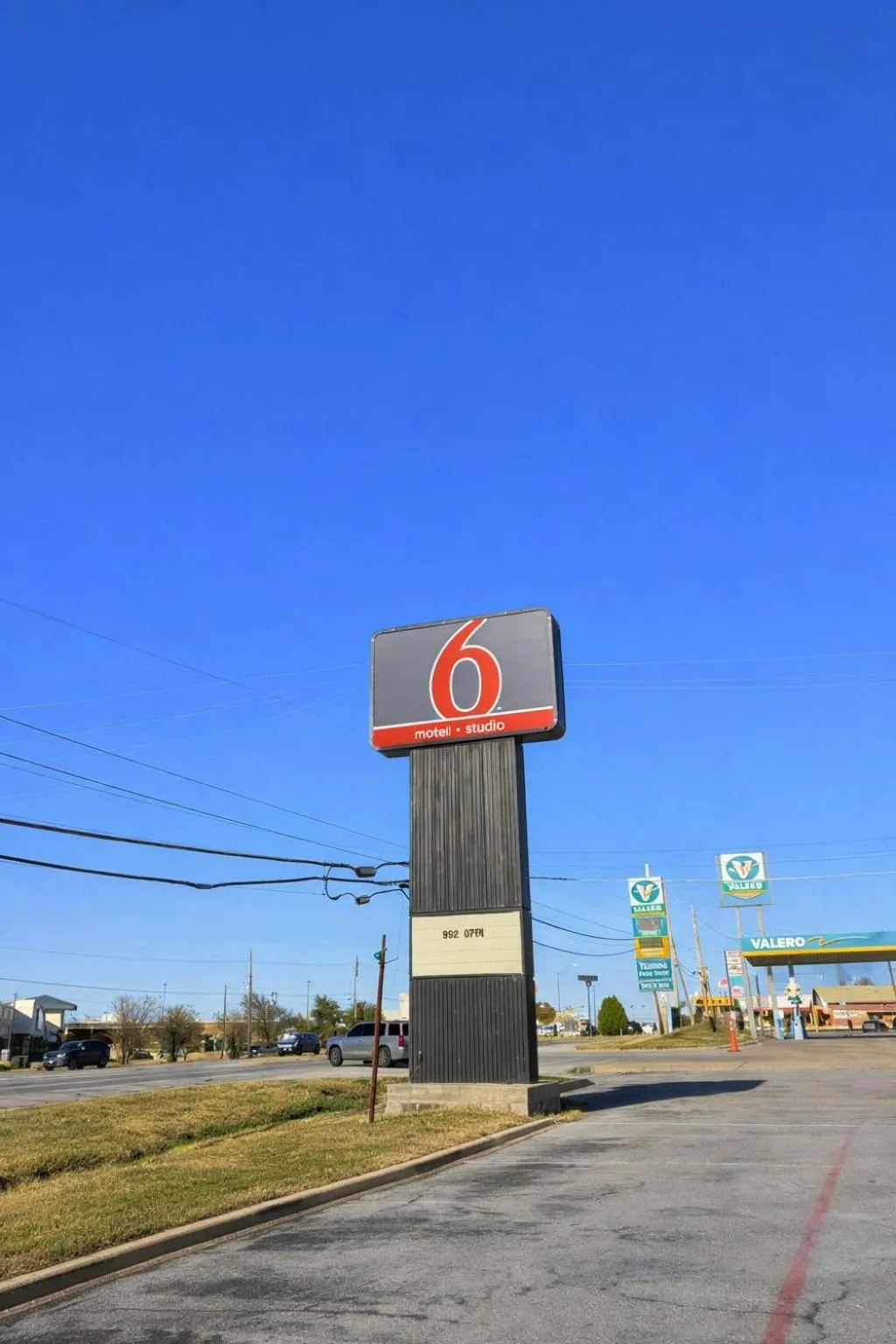 Property logo or sign in Motel 6 Sherman, TX