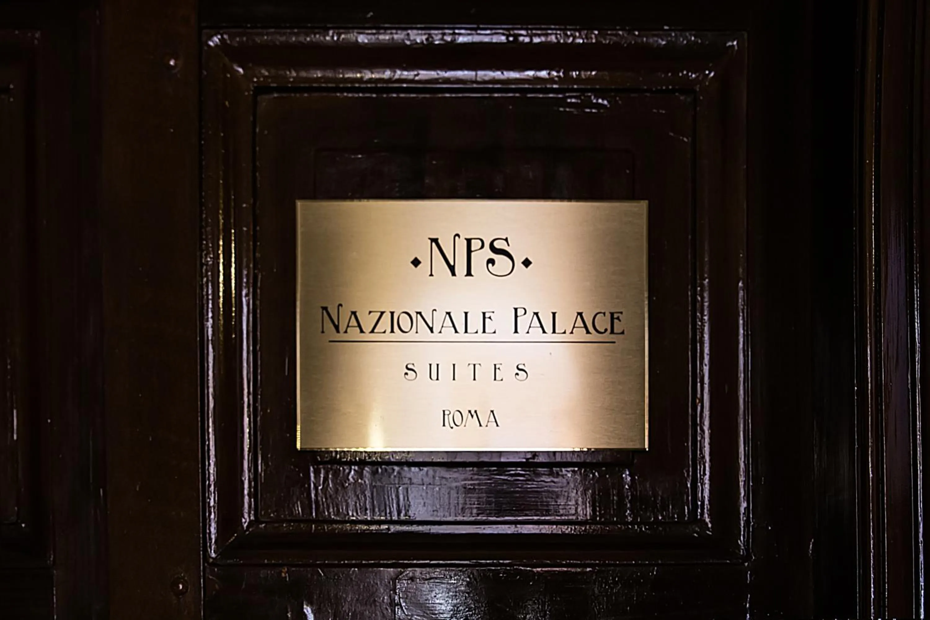 Property logo or sign in Nazionale Palace Suites