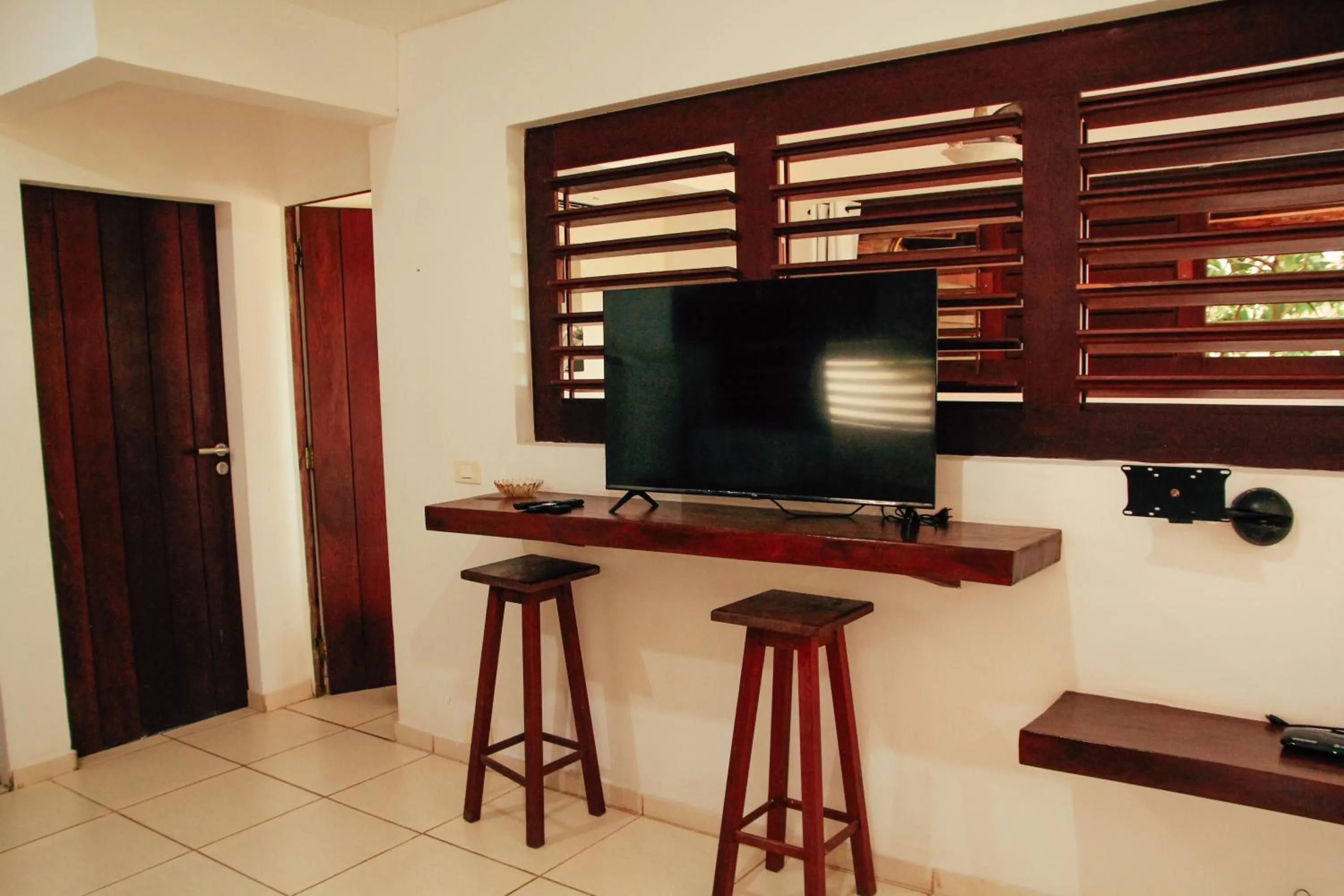 Communal lounge/ TV room in Pipa Panorama Aparthotel