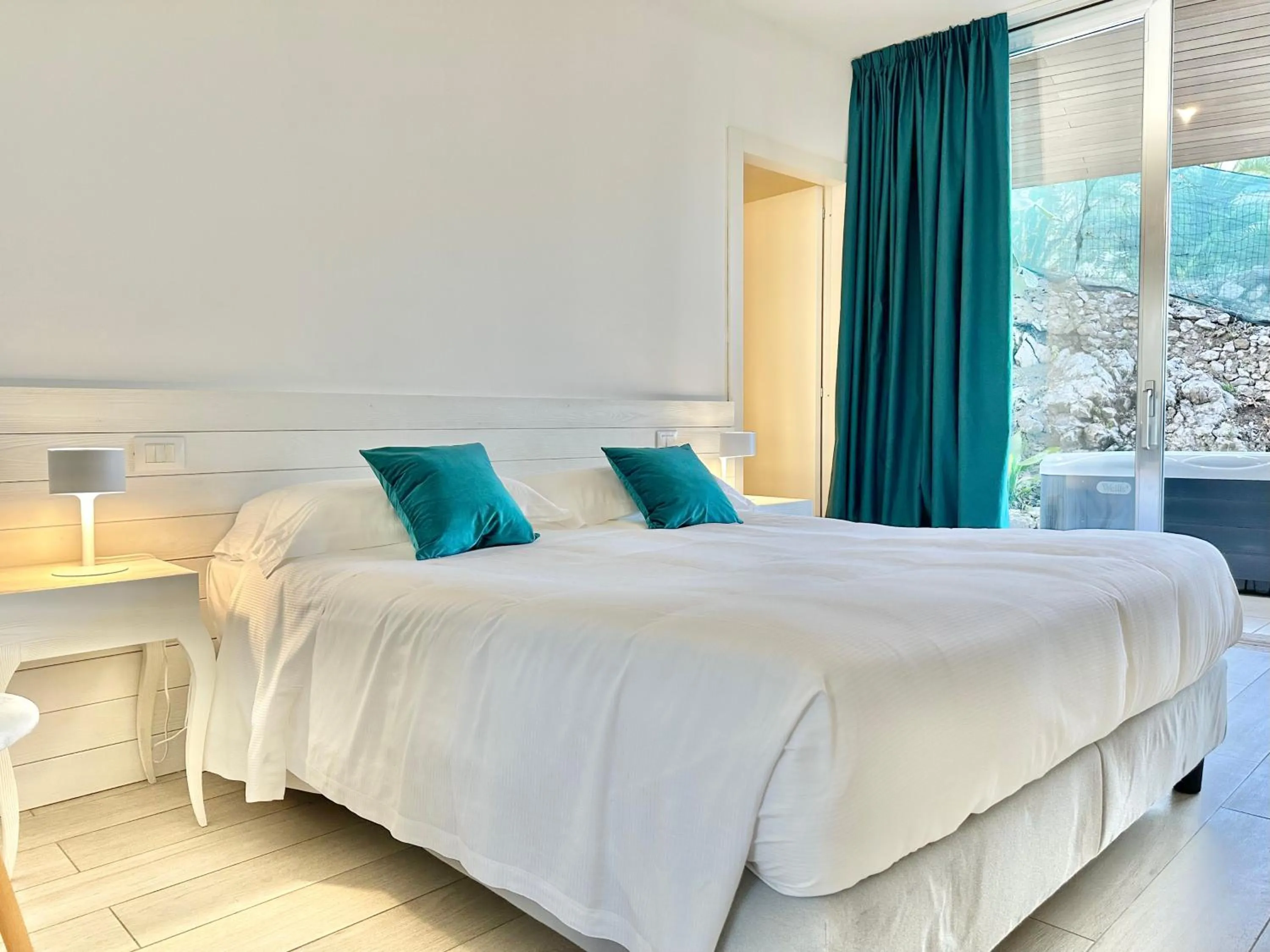 Bed in Isola Bella Infinity Suites