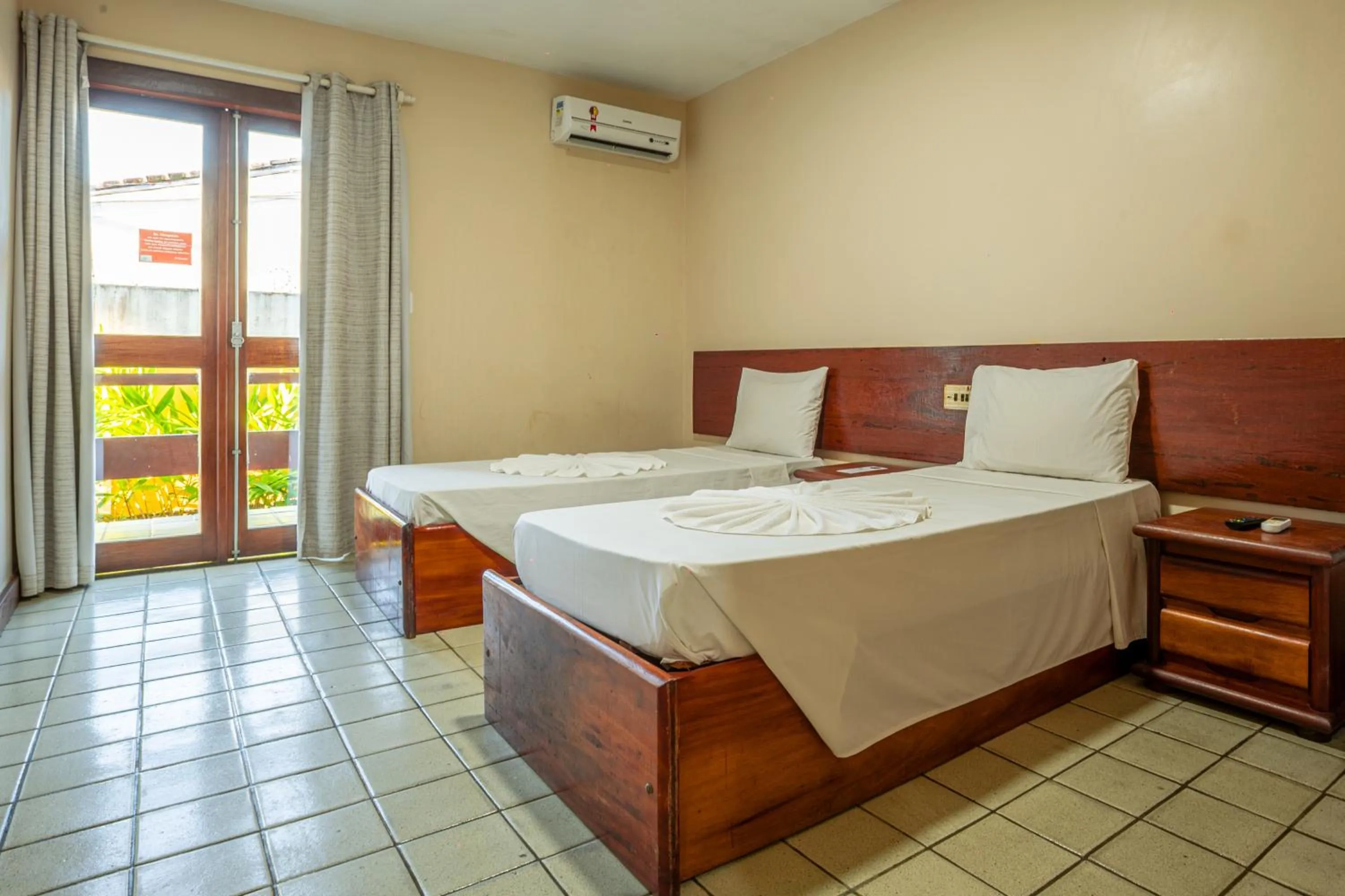 Bedroom, Bed in Rede Andrade Estrela Dalva Centro Hotel