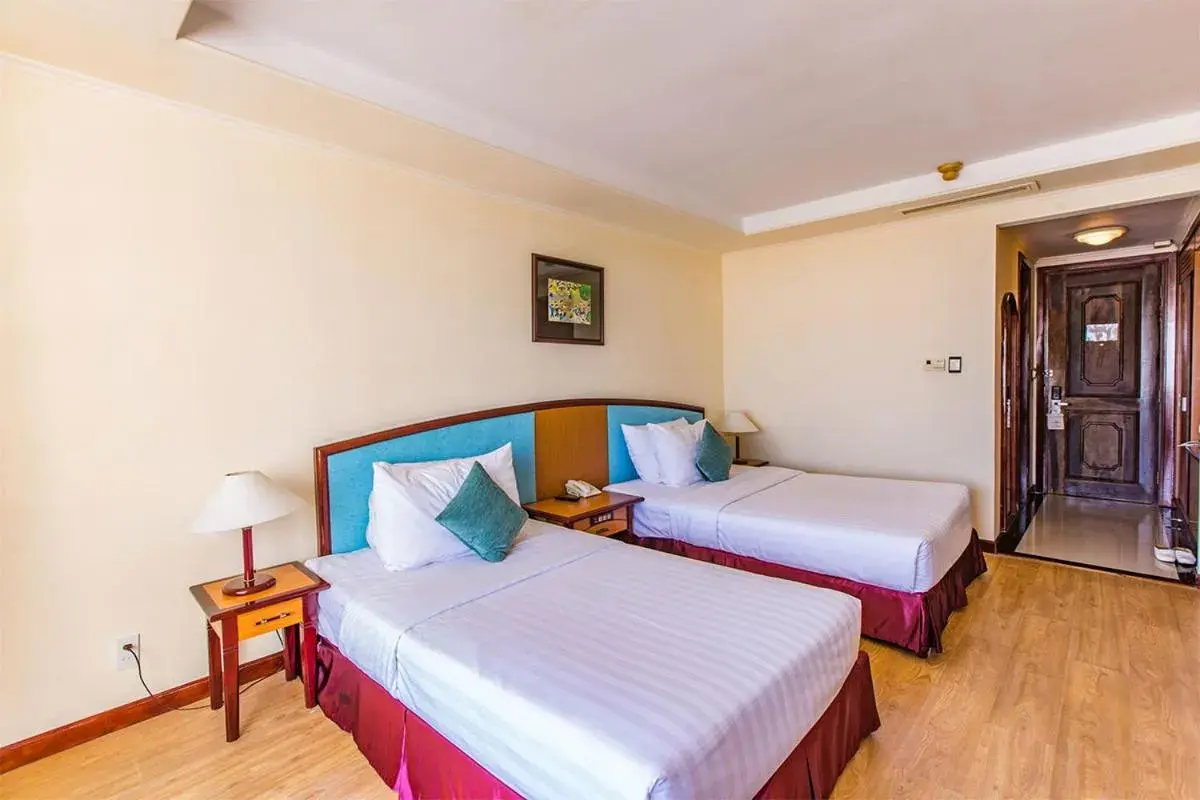 Bed in Yasaka Saigon Nha Trang Hotel & Spa Bed in Yasaka Saigon Nha Trang Hotel & Spa