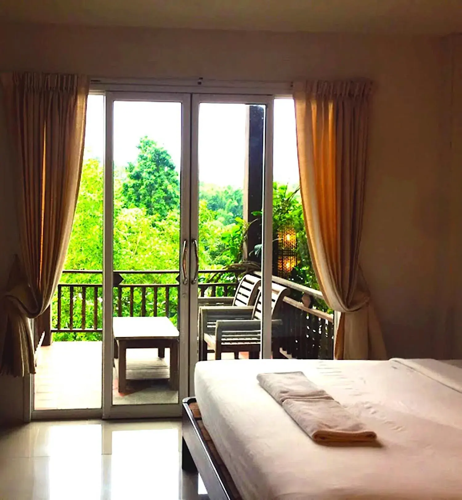 Balcony/Terrace, Bed in Nakakiri Resort & Spa Balcony/Terrace, Bed in Nakakiri Resort & Spa