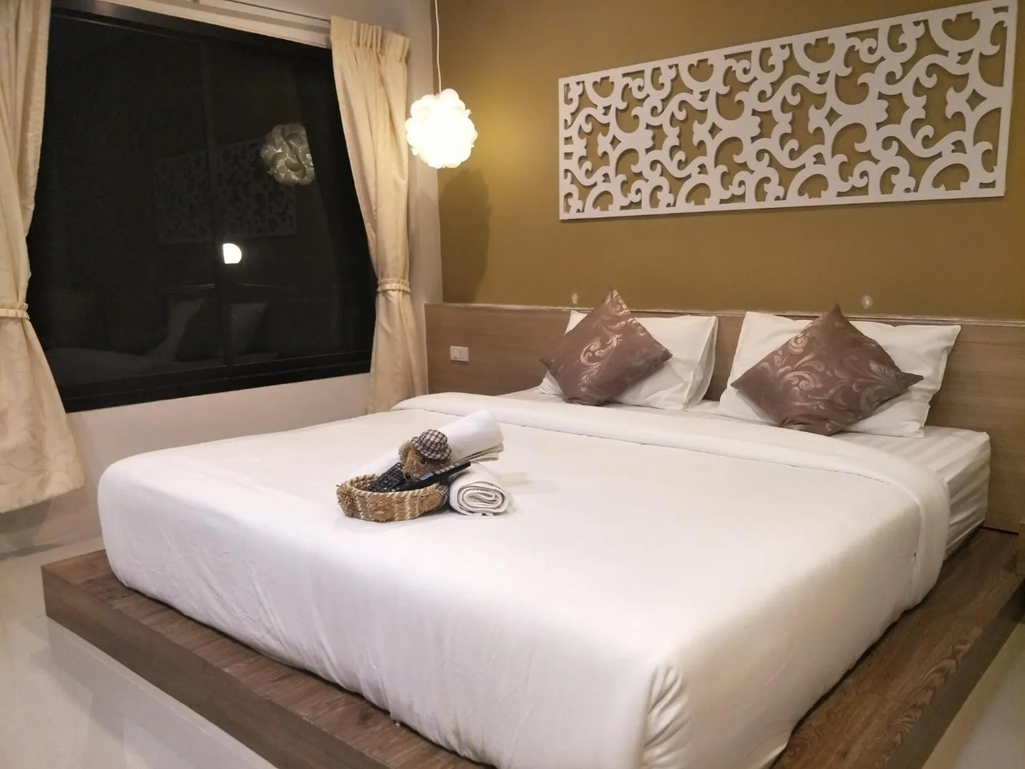 Bed in Suwi Coco Ville Resort