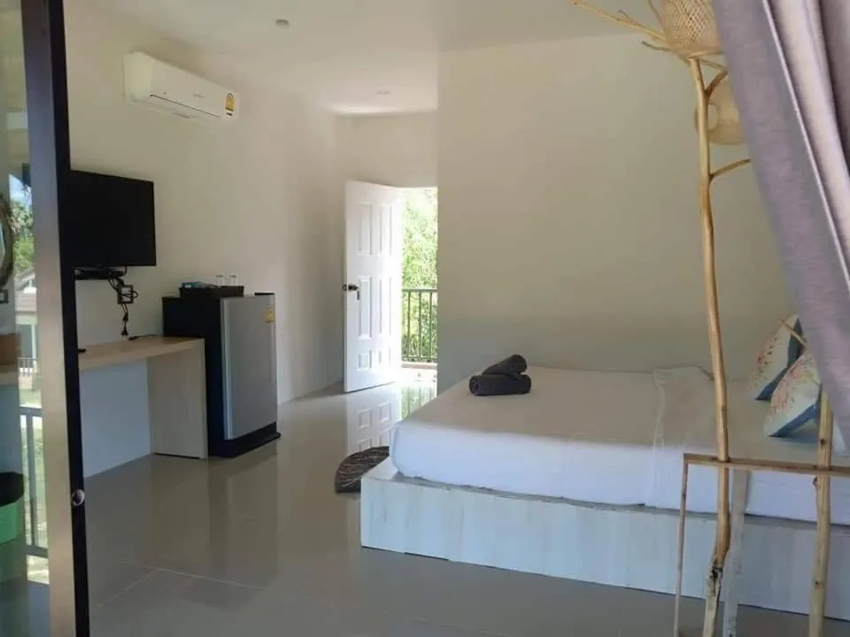 Bed in Suwi Coco Ville Resort